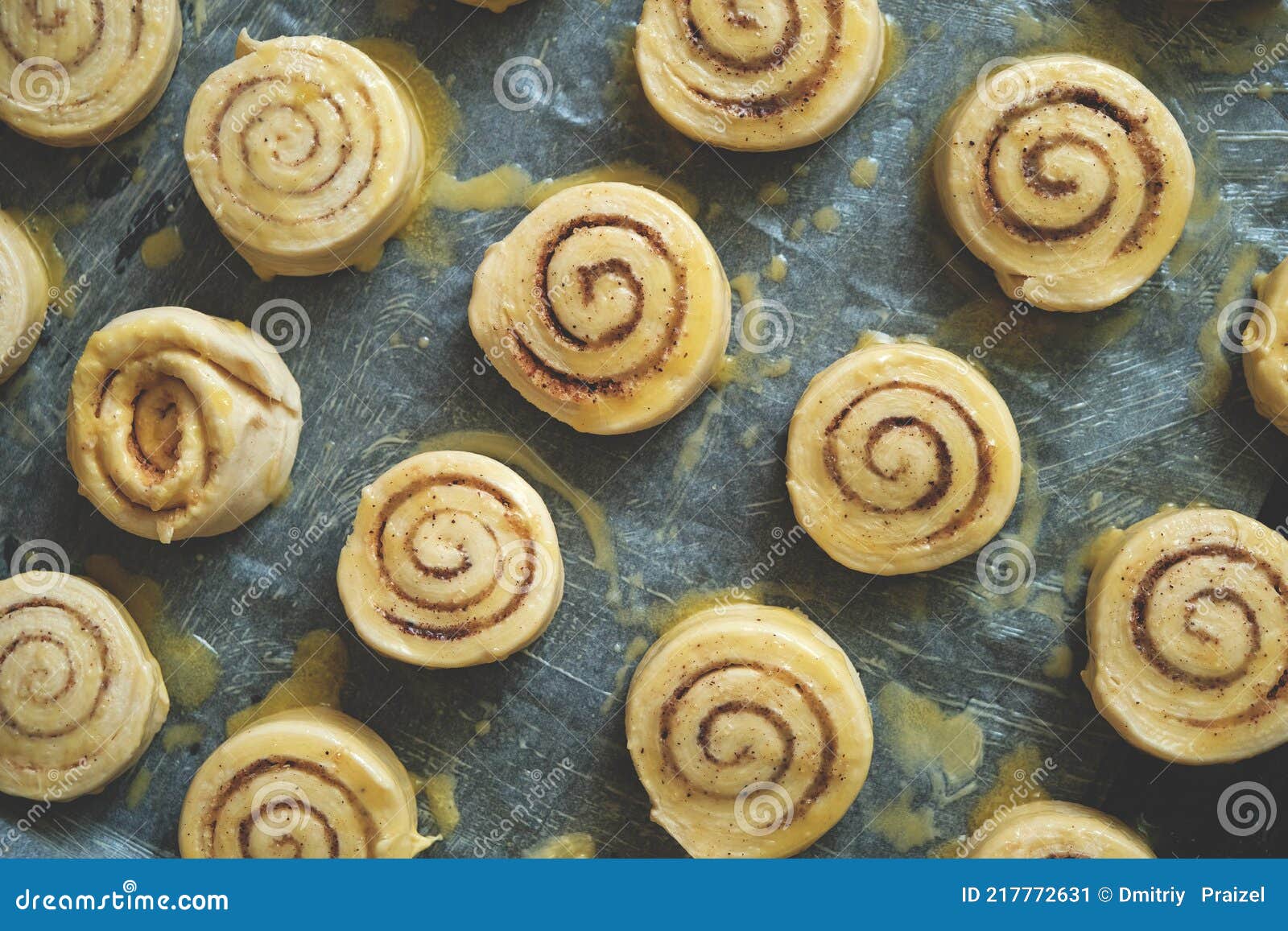 Blanks For Baking Cinnamon Rolls On Baking Sheet With Parchment Paper