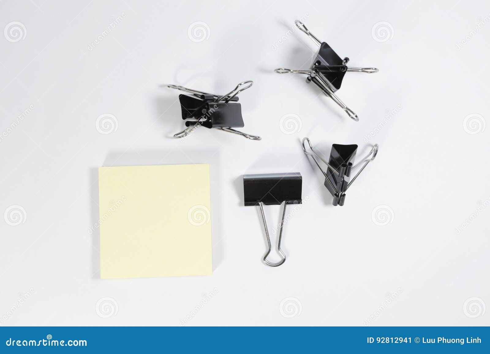 Blinder Clips and Memo Pad on White Background Stock Image Image of clipboard, laptop 92812941