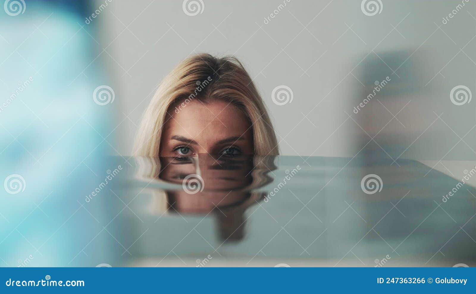 woman-afraid-of-her-own-face-mask-in-mirror-reflection-scared-gif