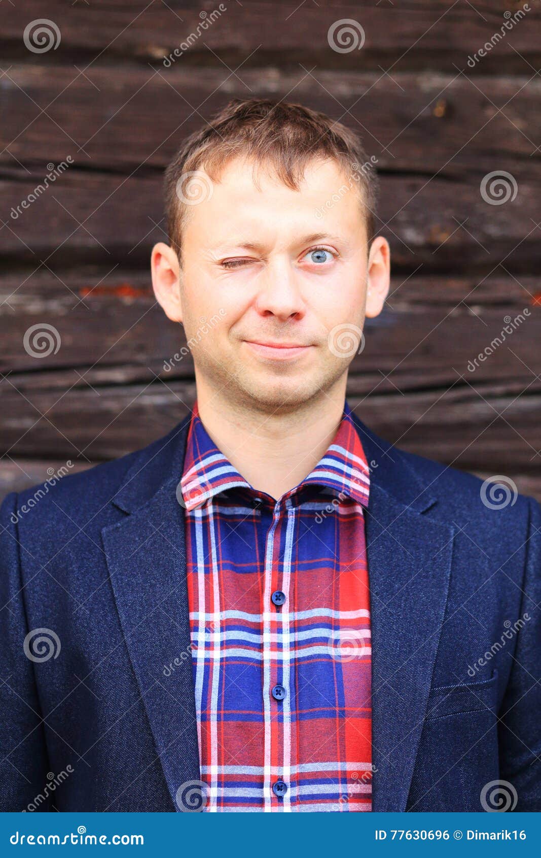 Blinking Man in Blue Jacket and Checkered Shirt Stock Photo Image of