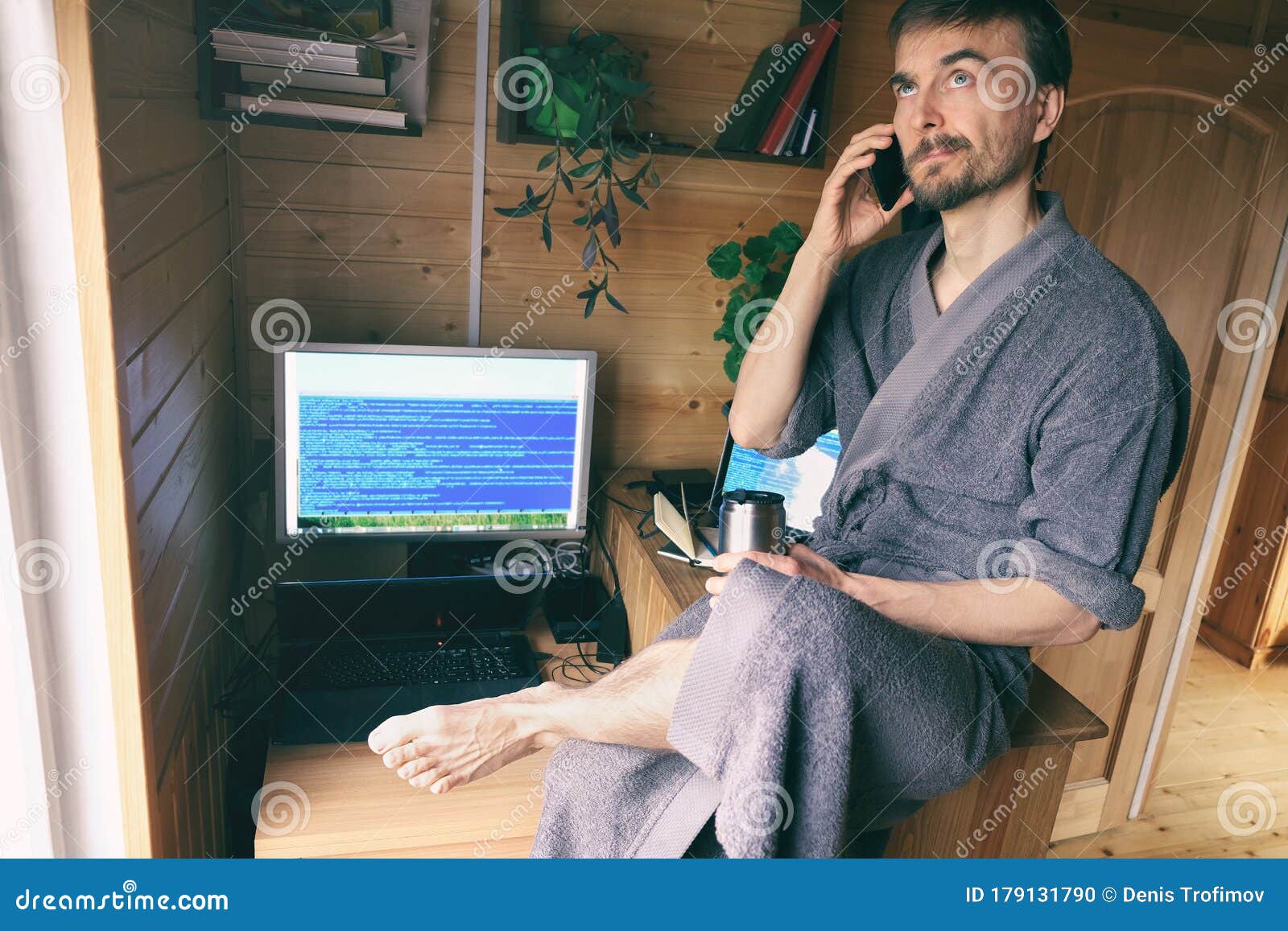 Freelancer in Bathrobe Work from Home in Quarantine, Talking on