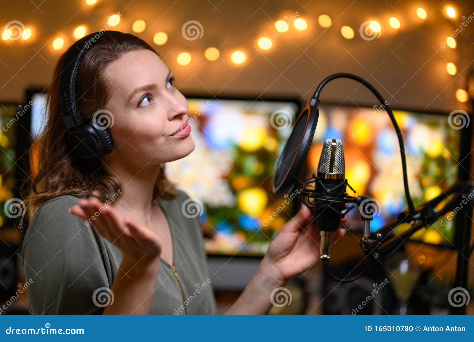 A Blogger is Recording a Podcast with a Microphone and Computers in the  Background. Blogging and Podcasts, Recording on YouTube Stock Photo - Image  of happy, blog: 165010780
