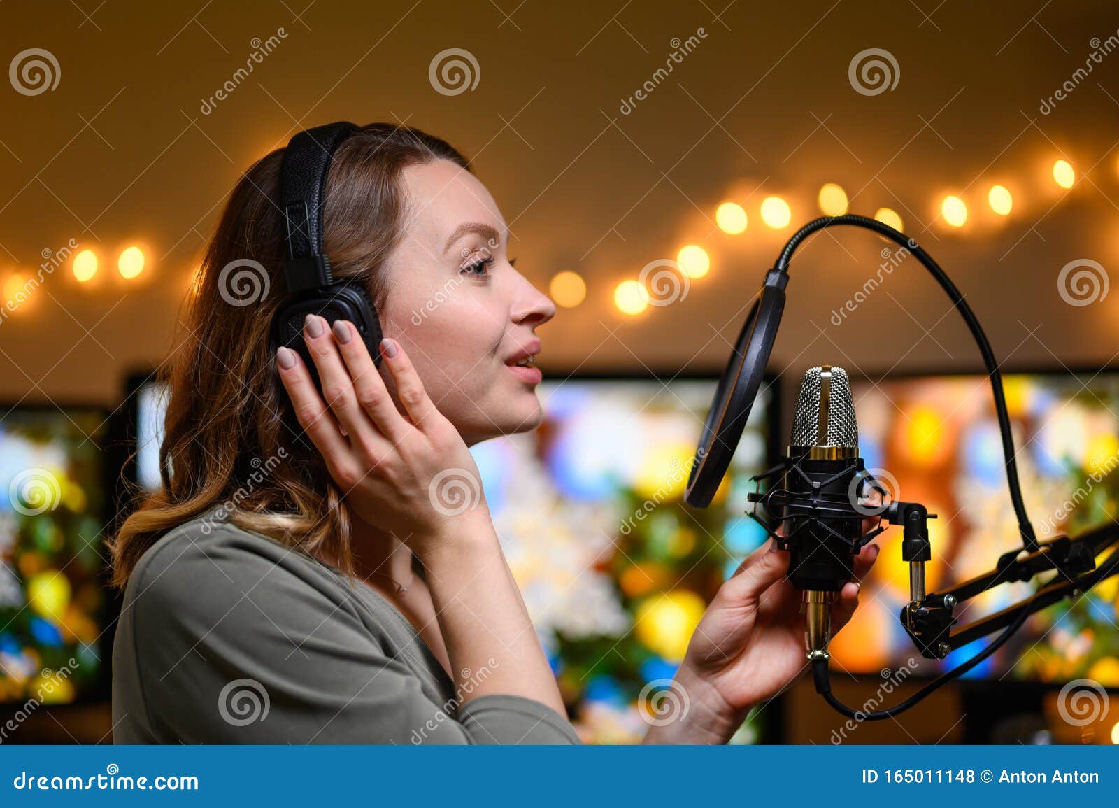 A Blogger Is Recording A Podcast With A Microphone And Computers In The Background Blogging And Podcasts Recording On Youtube Stock Photo Image Of Lifestyle Headphones A Blogger Is Recording A Podcast With A Microphone And Computers In The Background Blogging And Podcasts Recording On Youtube Stock Photo Image Of Lifestyle Headphones