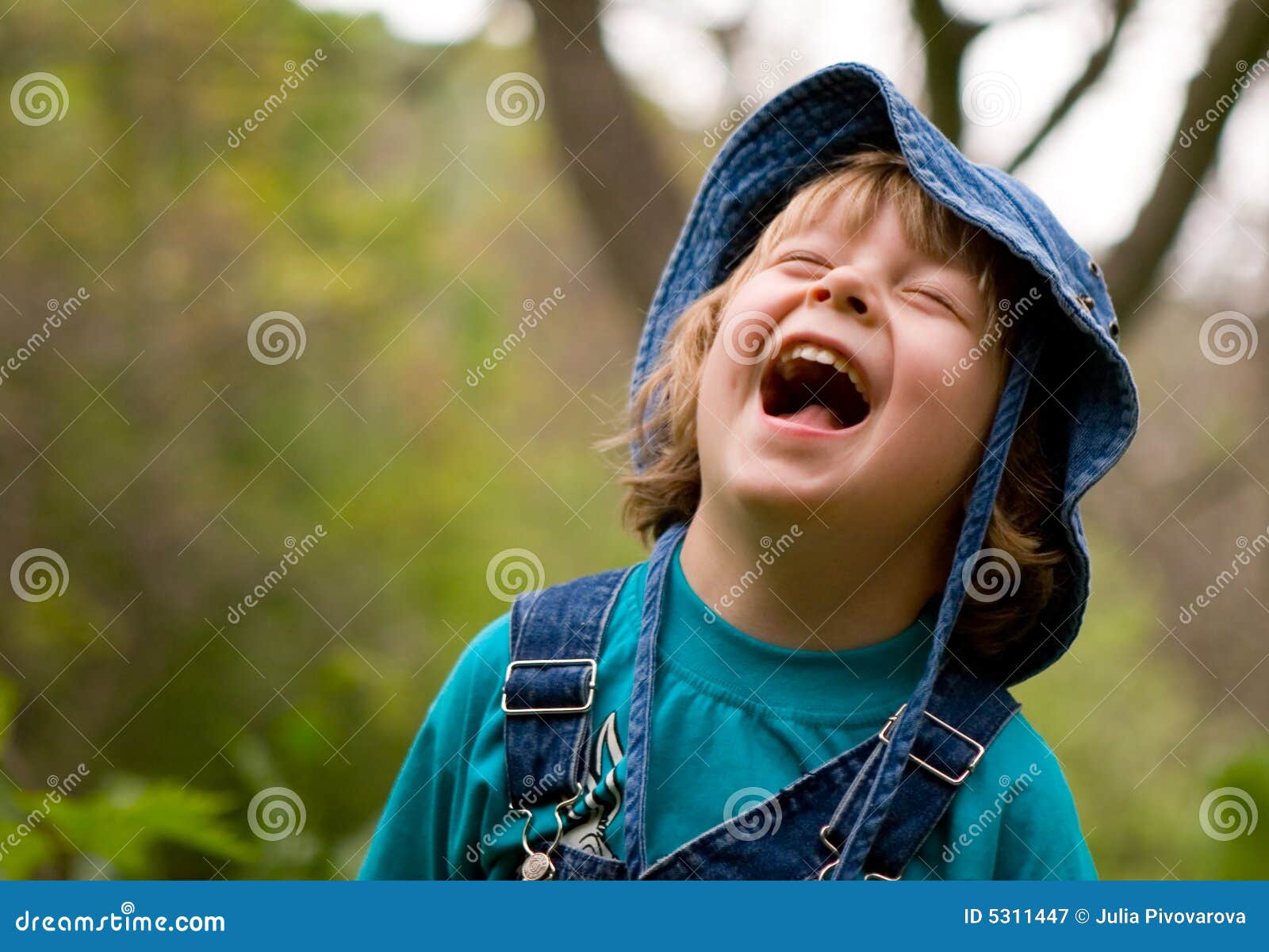Blond boy are laughing stock image. Image of childhood 5311447