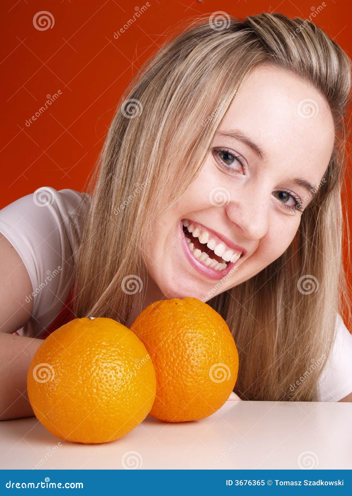 Blond girl with oranges stock image. Image of diet, snack 3676365
