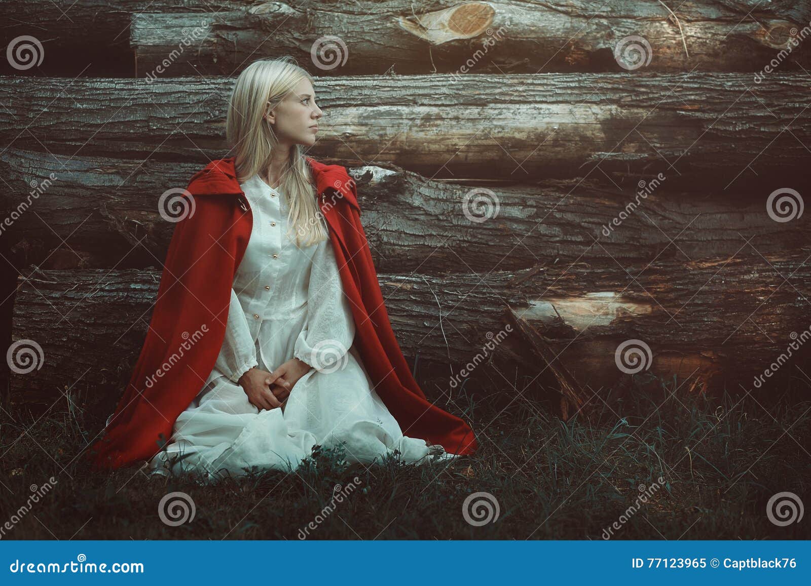 blond woman with red hooded cloak