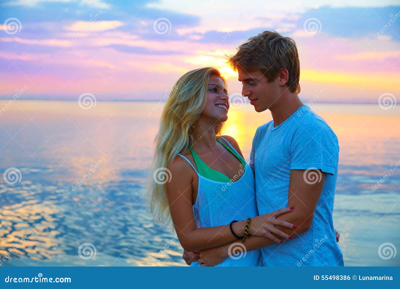 Blond Young Couple Hug In Sunset Sea Lake Happy Sto