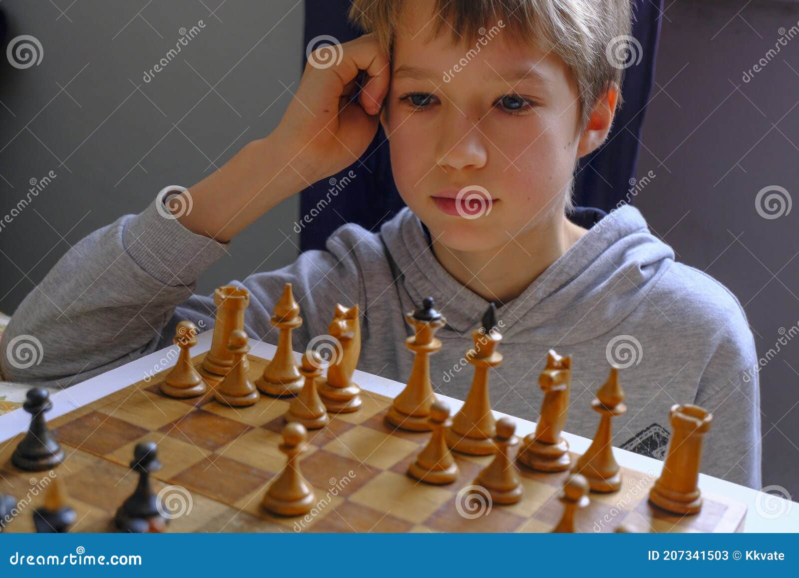 Blonde Caucasian Boy Thinking of a Next Chess Move Playing Chess. Strategy,  Planning Concept Stock Image - Image of queen, people: 207341503