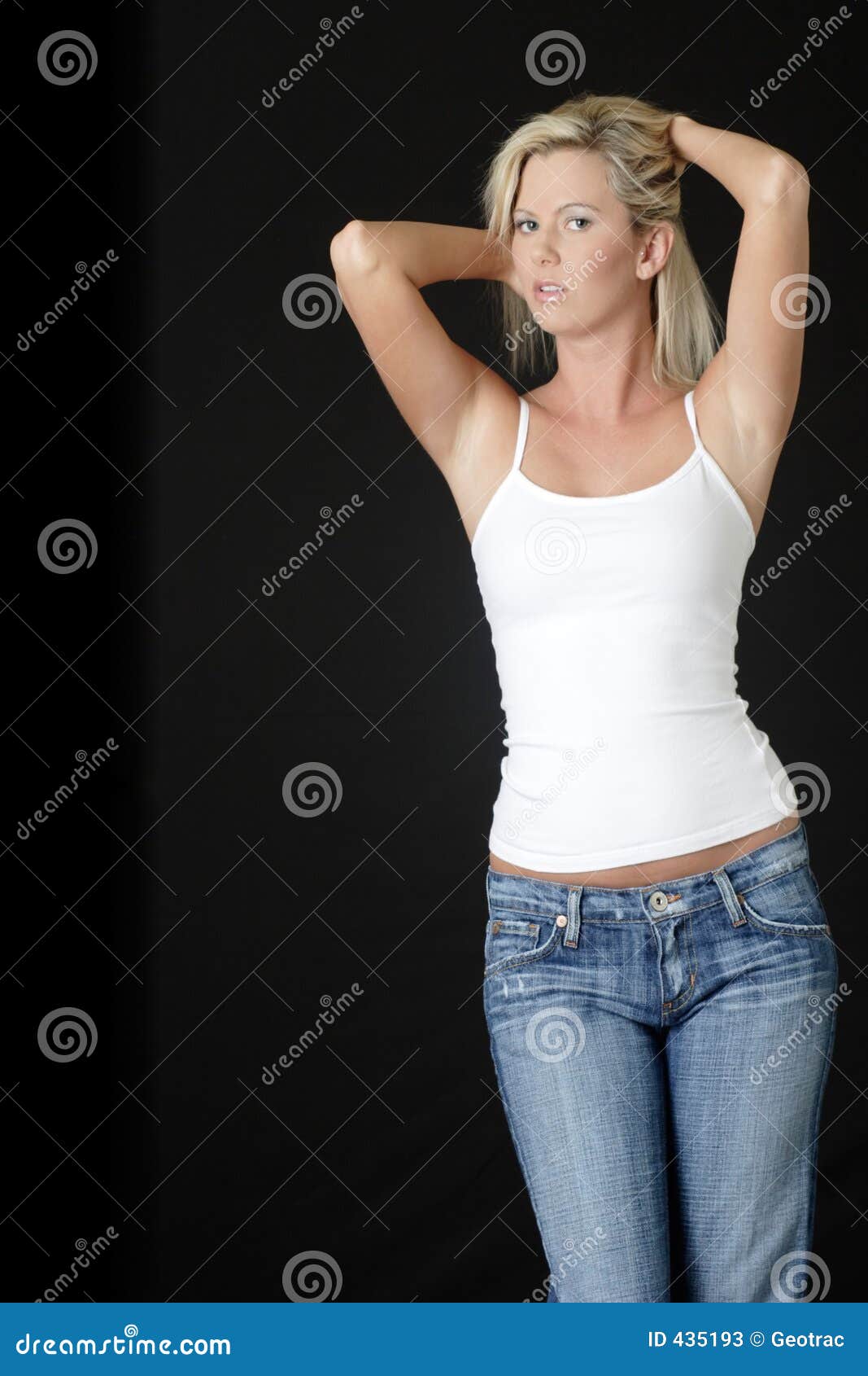 Blonde Beautiful Young Woman Wearing Jeans Stock Photo by ©AllaSerebrina  194200278