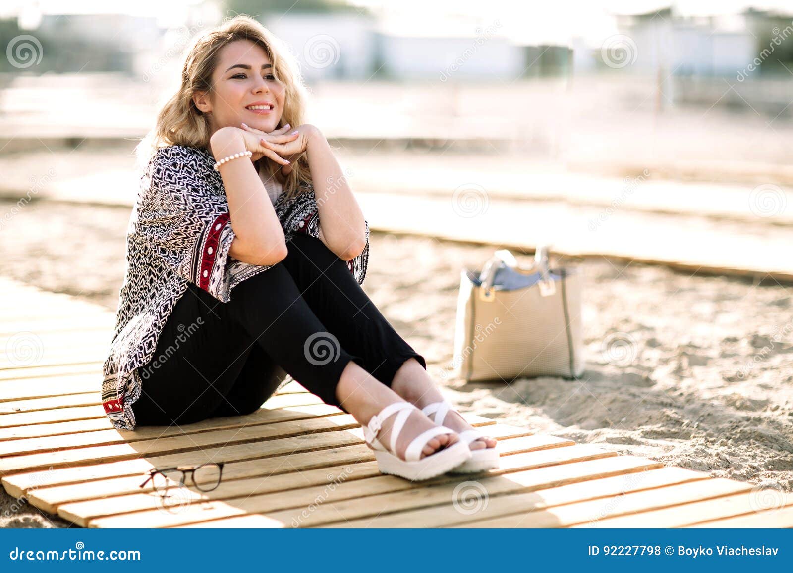 Blonde Girl on the Beach of the Sandy Beach by the Sea Stock Photo ...