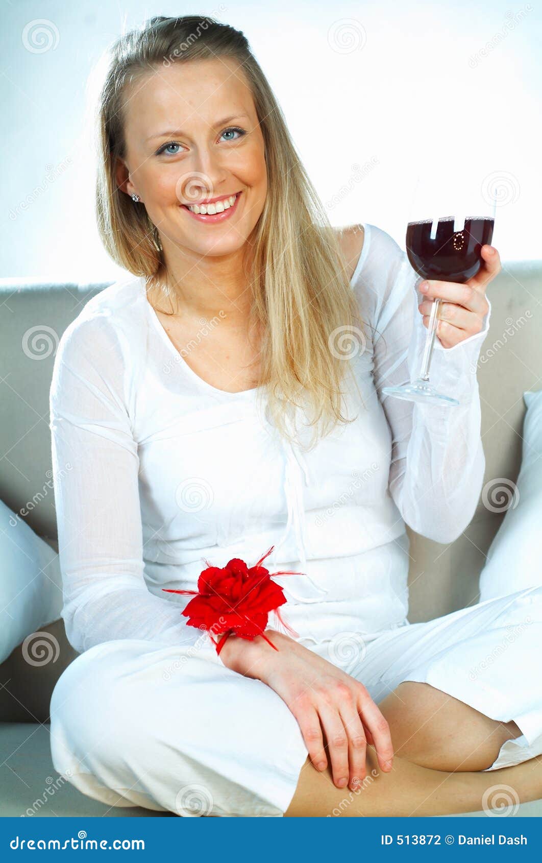 blonde girl with glass of wine