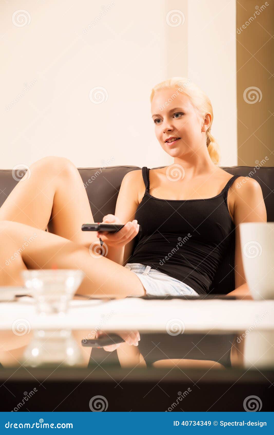 Blonde Girl With A Remote Control Stock Image - Image: 40734349