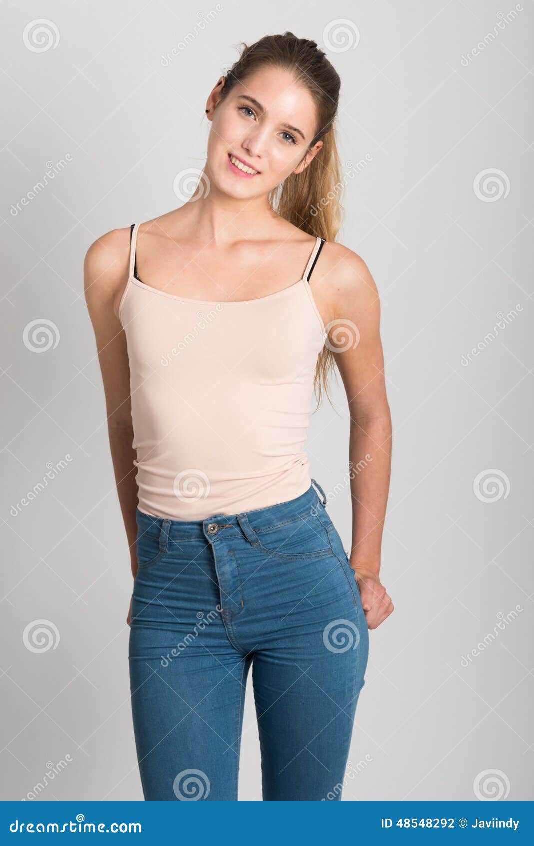 Blonde Girl Wearing Blue Jeans And T shirt Studio Shot Blonde Girl Wearing Blue Jeans And T shirt Studio Shot