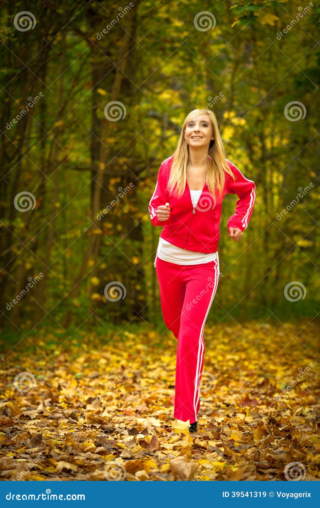 Blonde Girl Young Woman Running Jogging in Autumn Fall Forest Park ...