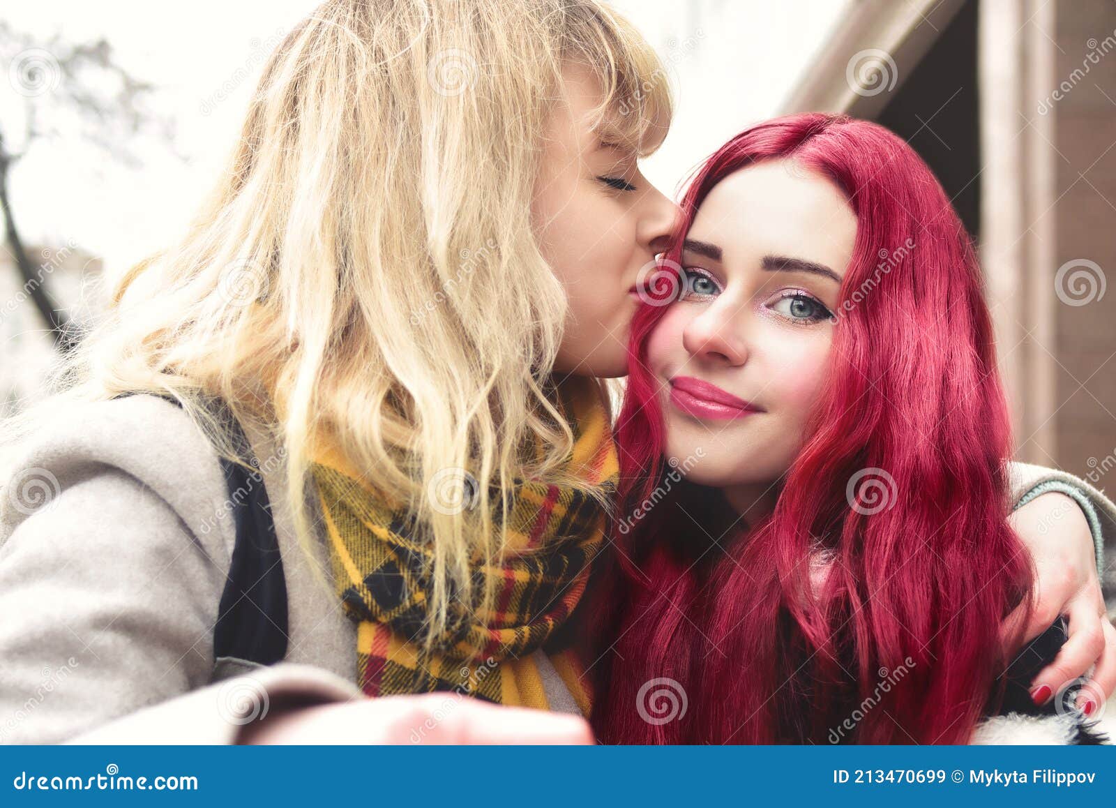 Lgbt Blonde Lesbian Girl Kissing Forehead Of Her Loving Girlfriend With Pink Hair Gentle