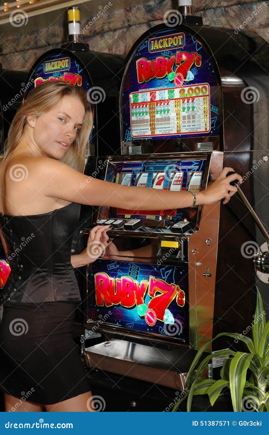 Young Woman In Casino On A Slot Machine Stock Image 