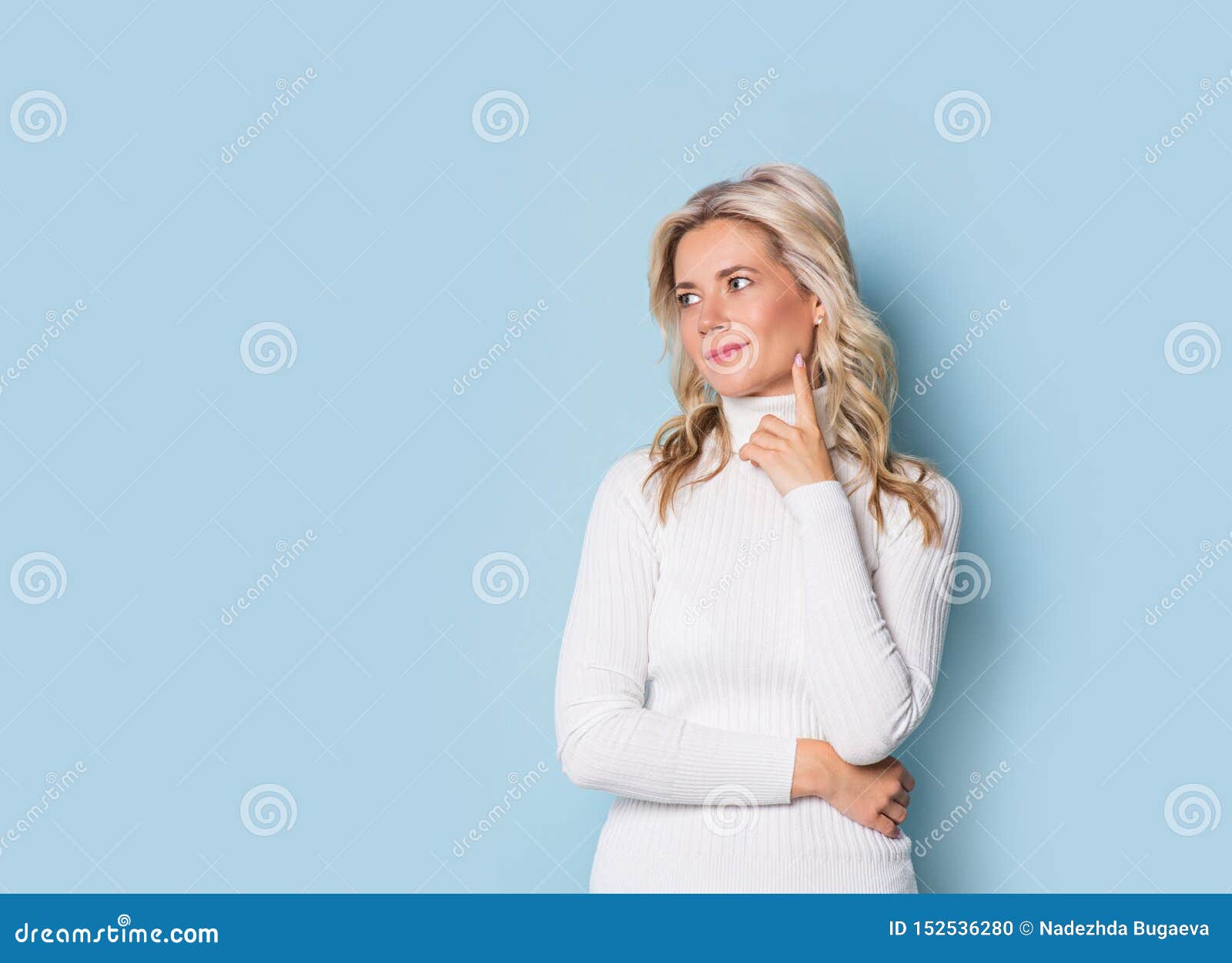 blonde woman adult attractive beautiful smiling portrait, cauasian and scandinavian girl on blue background