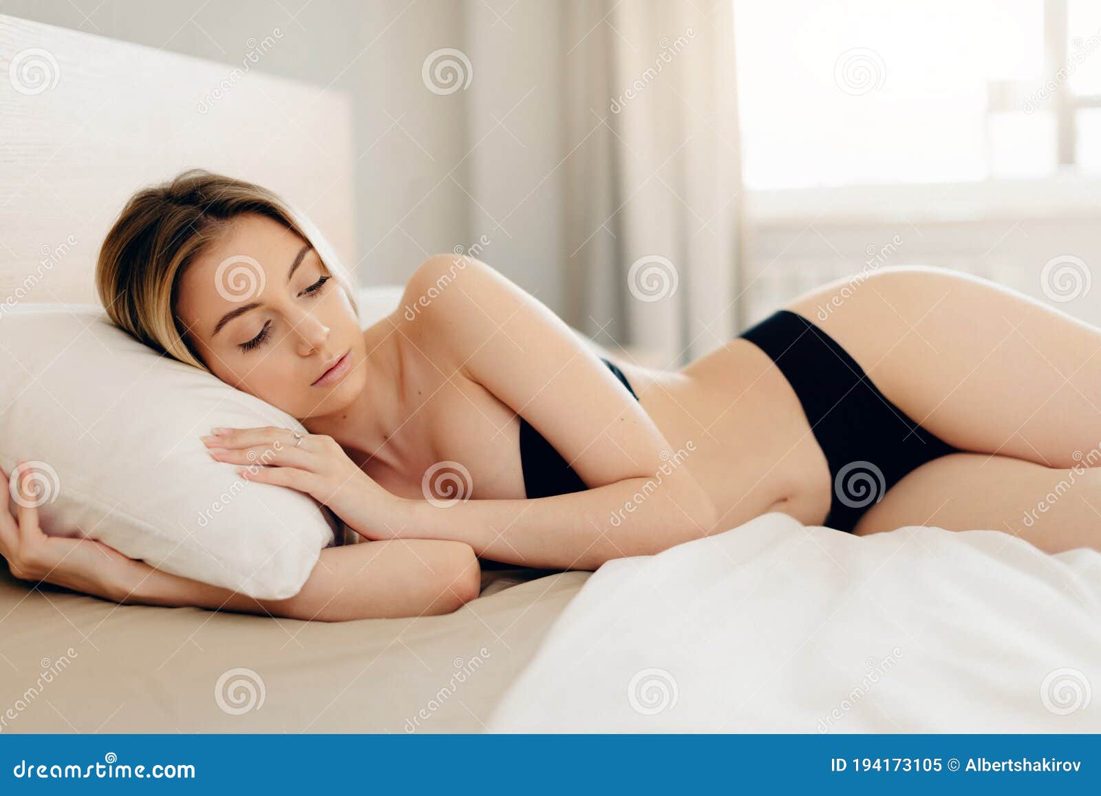 Woman in Black Underwear Sleeping in Bed in Seductive Pose without Blanket.  Stock Image - Image of european, home: 194173105
