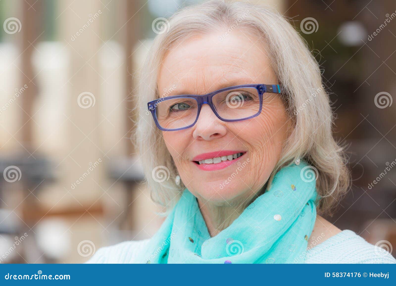 Blonde woman glasses. Beautiful blonde woman with glasses close up