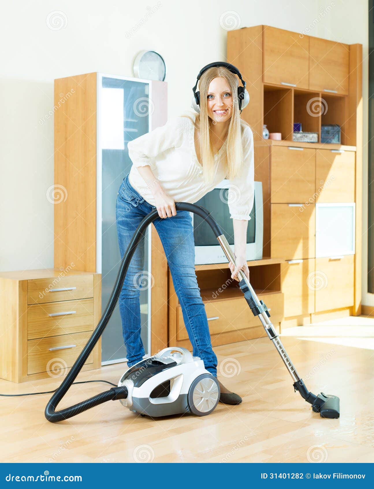 blonde-woman-headphones-cleaning-vacuum-cleaner-happy-parquet-floor-home-31401282.jpg