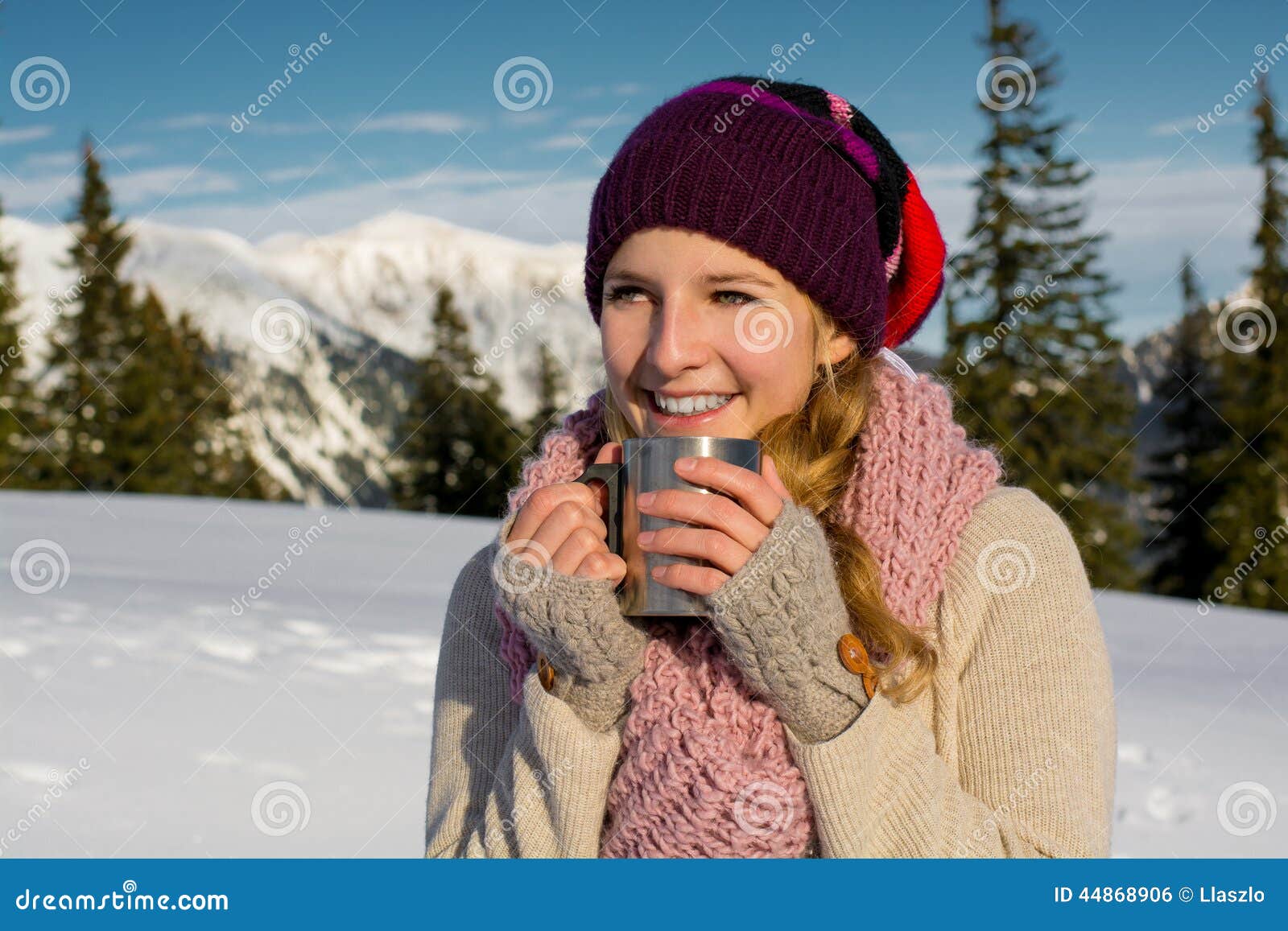 blonde woman hoding mug