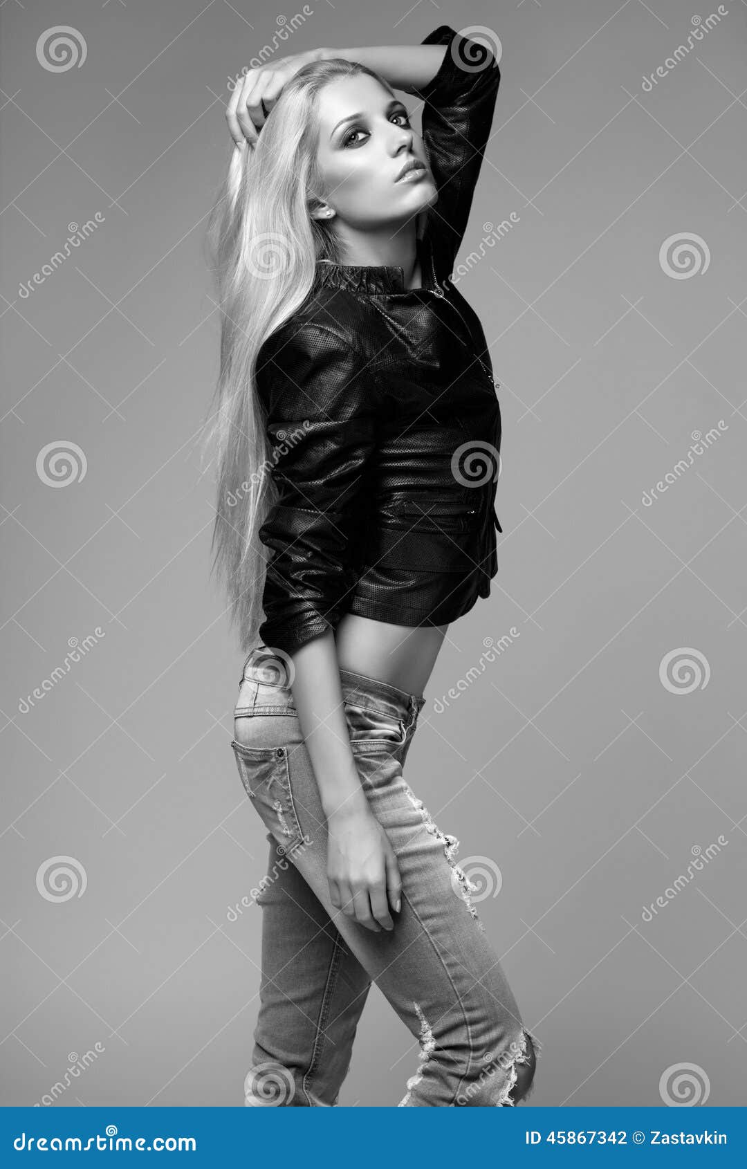 Blonde Woman In Ragged Jeans And Jacket Stock Photo - Image of jacket ...