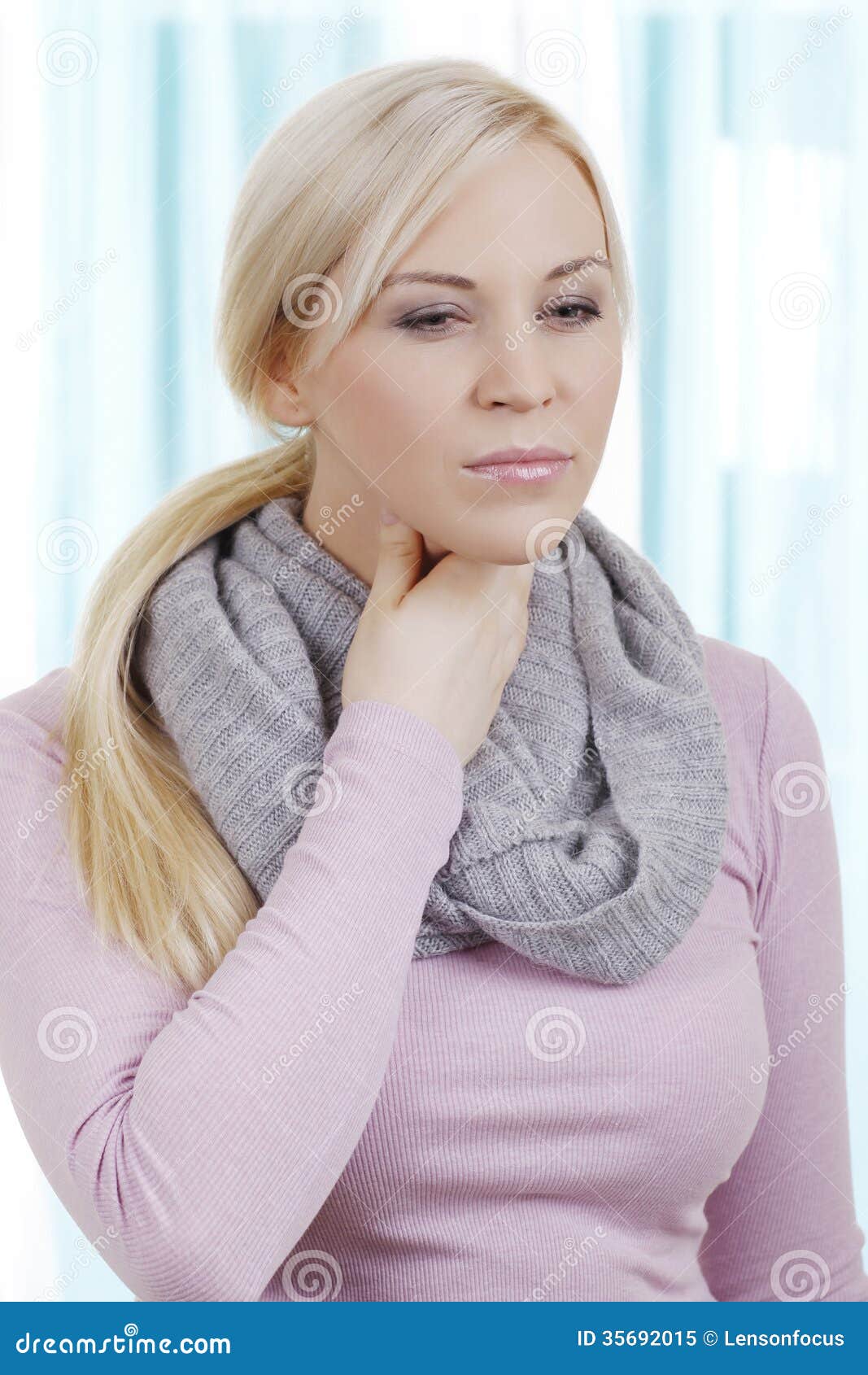 blonde woman with sore throat