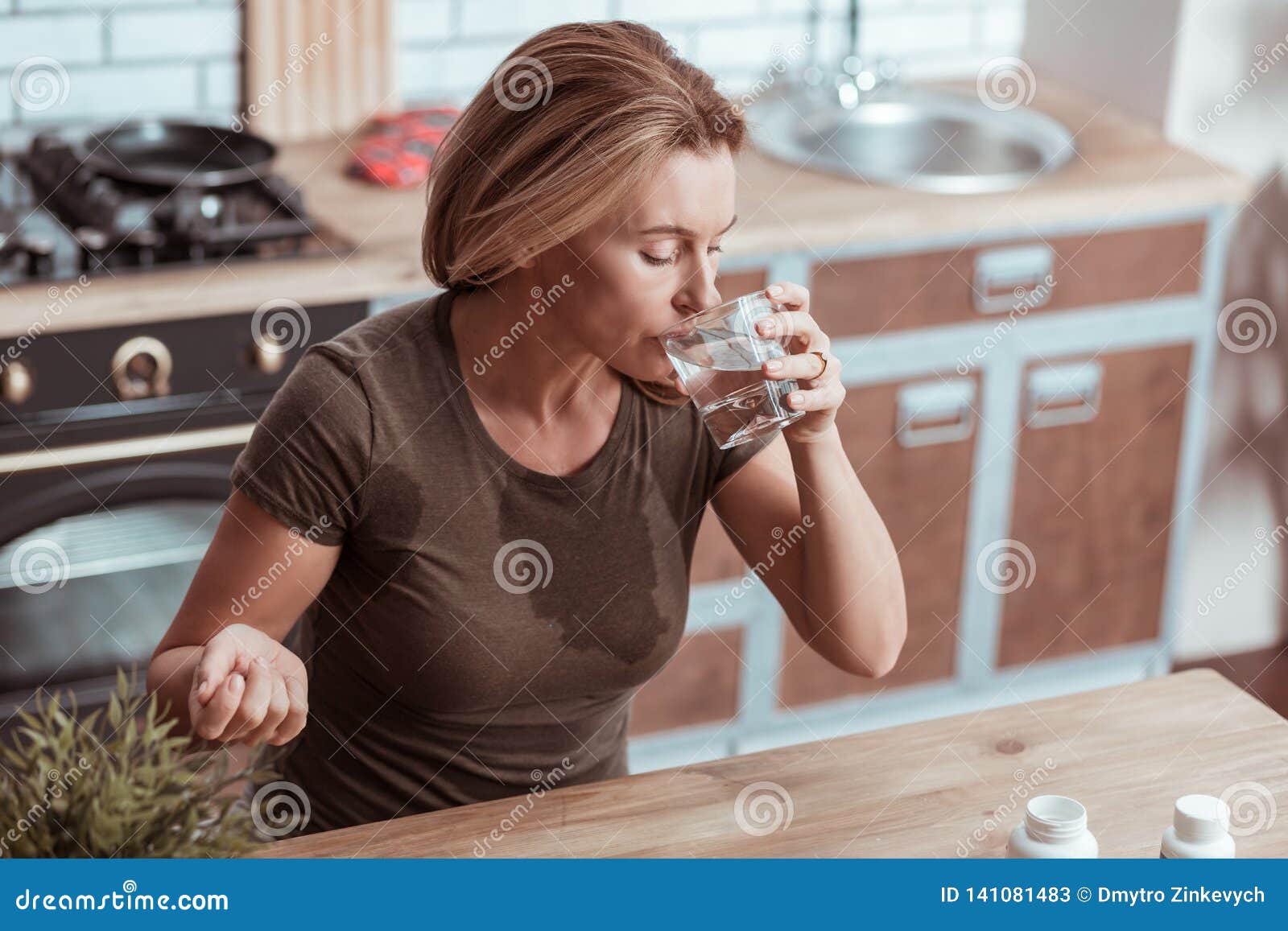 Blonde Woman Taking Medicine after Strong Panic Attack Stock Image ...