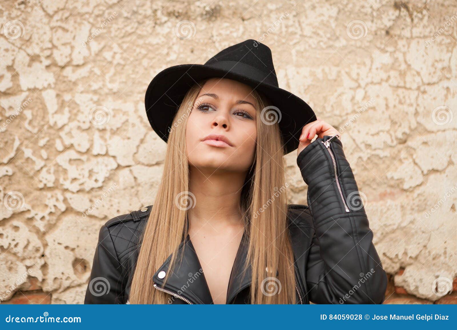 Blonde Young Woman with Black Hat Stock Photo - Image of black, leather ...