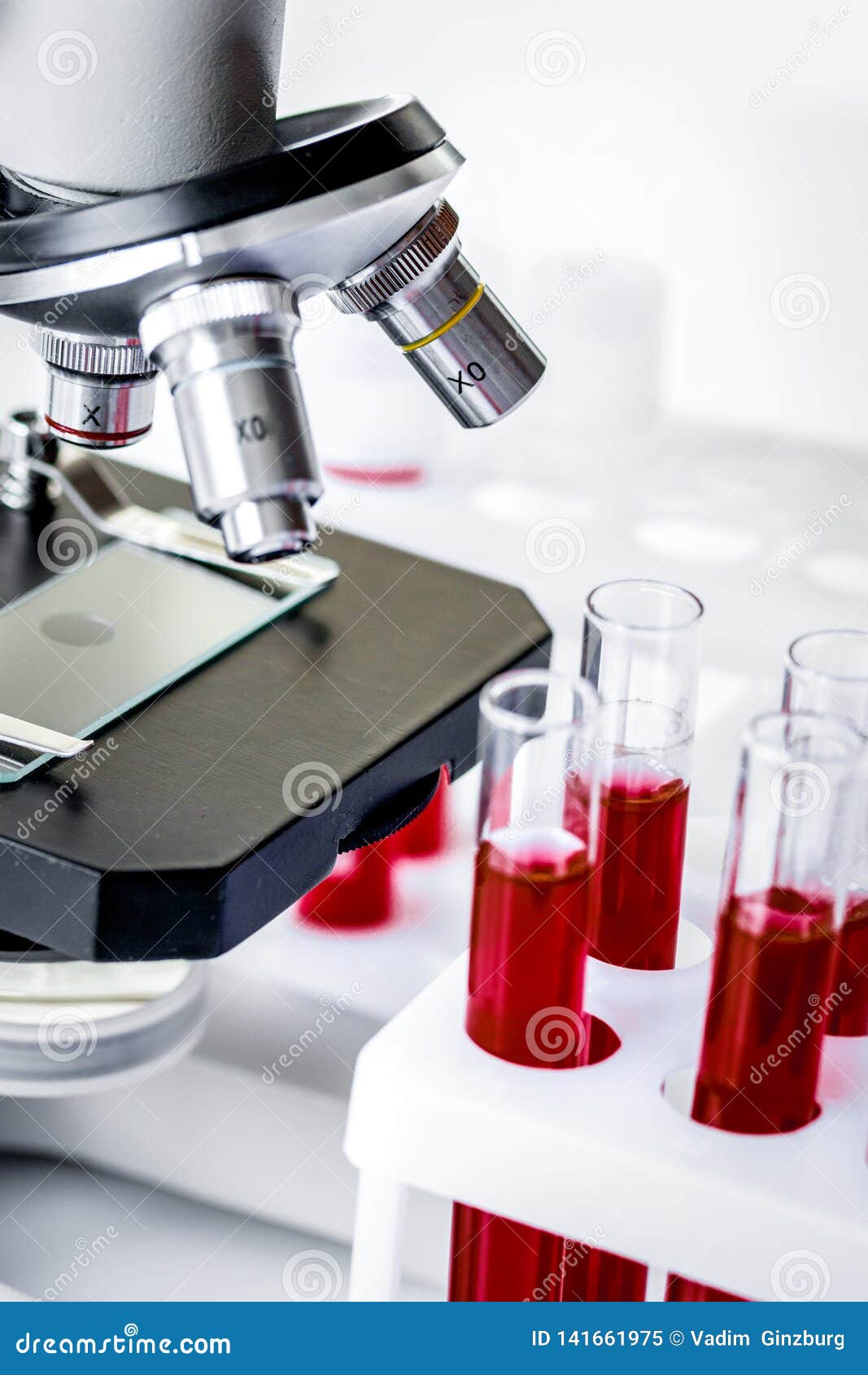 Blood in Glass Tubes on Background of Microscope Stock Image - Image of ...