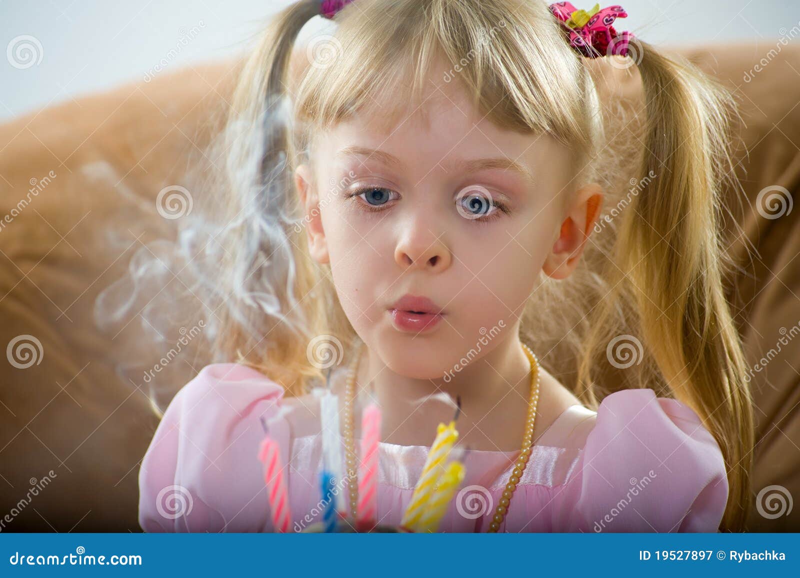 Blowing on a Birthday Candle Stock Image Image of pretty, child 19527897
