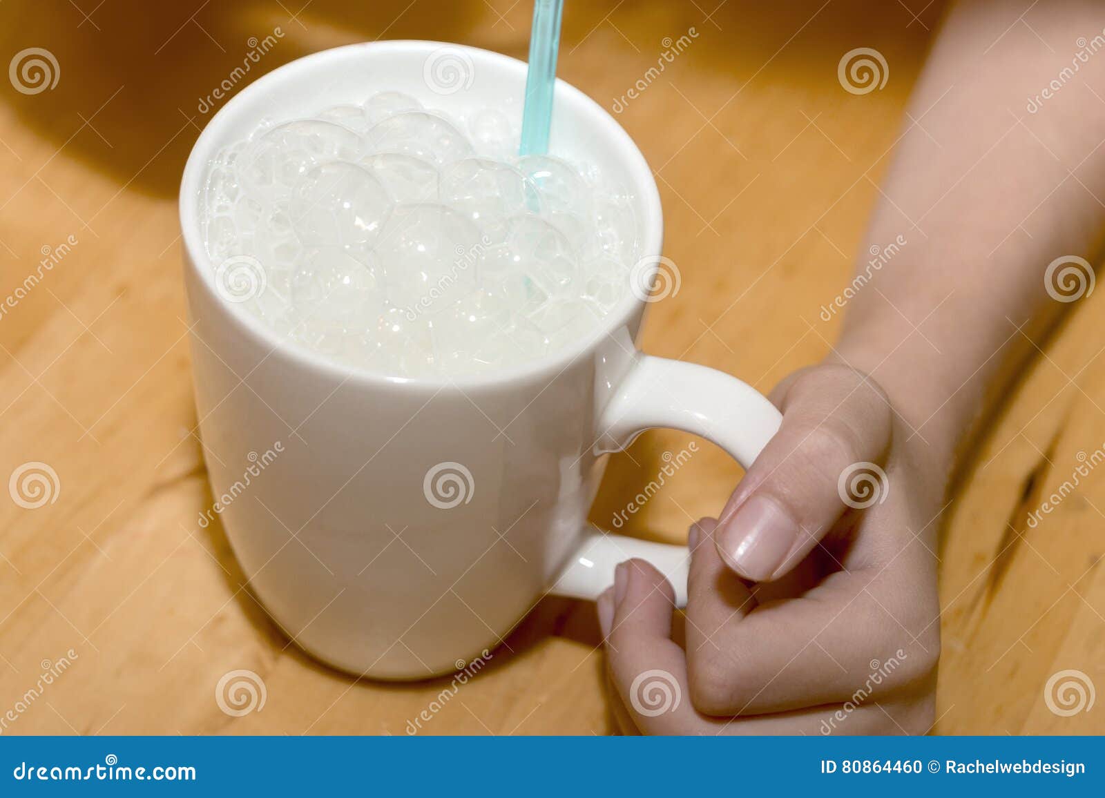 Blowing Bubbles into Milk through a Blue Straw Stock Photo Image of tasty, aqua 80864460