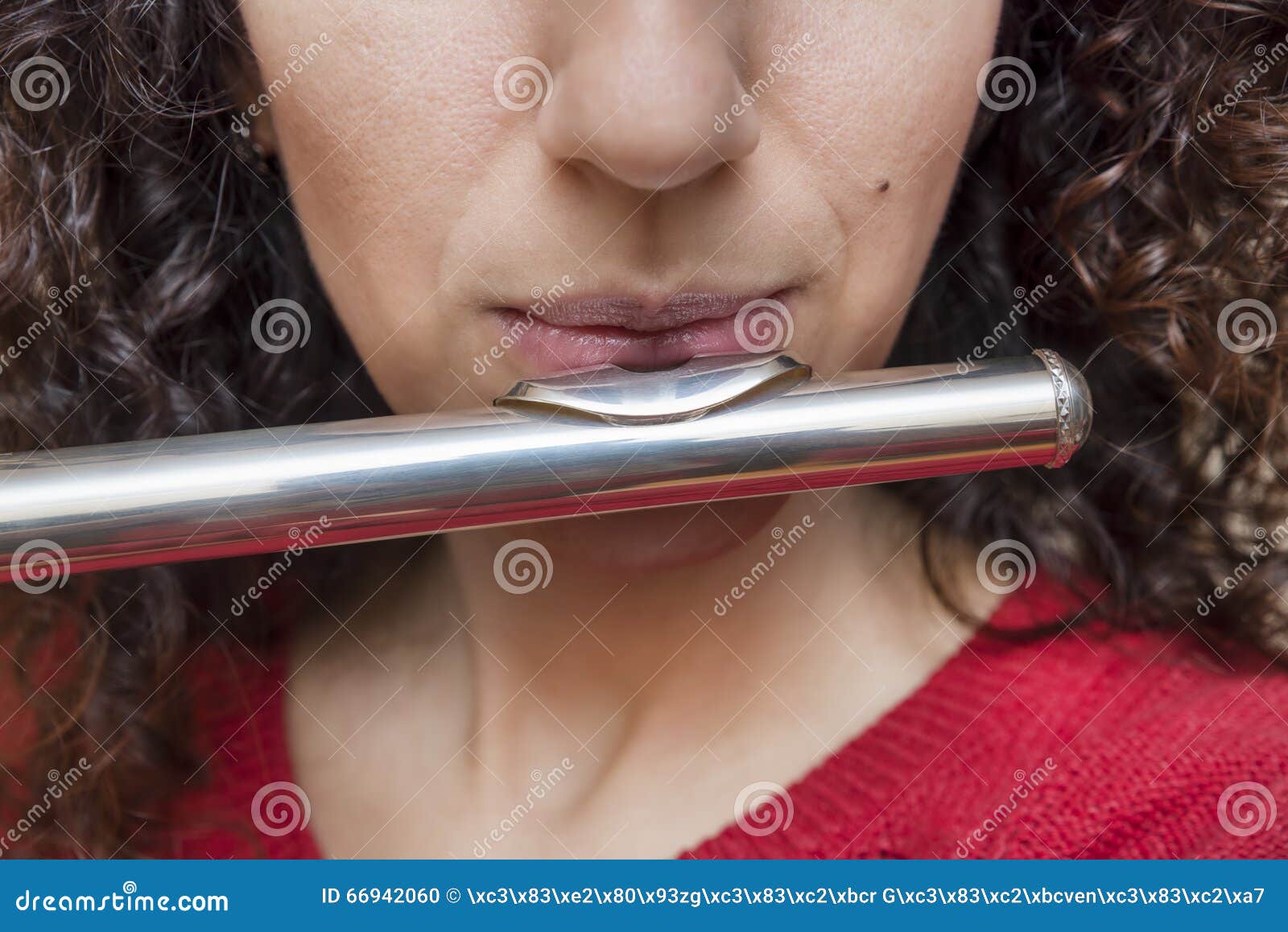 Blowing into the Flute stock photo. Image of player, concert 66942060
