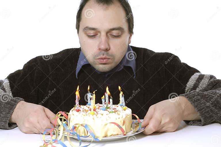 Blowing out the candles stock photo. Image of holds, bakery 496742