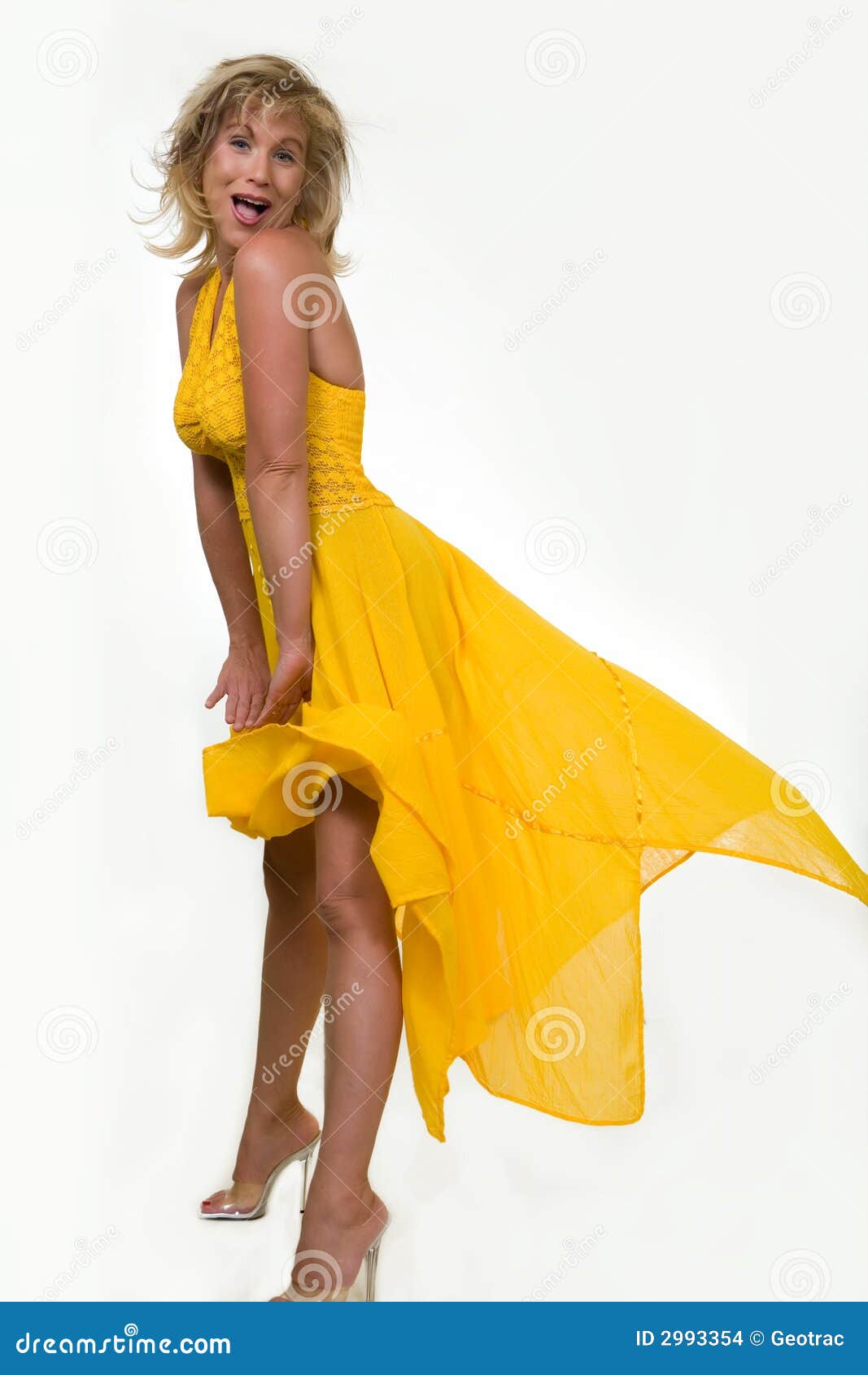 Blowing yellow dress stock photo. Image of fashion, pretty 2993354