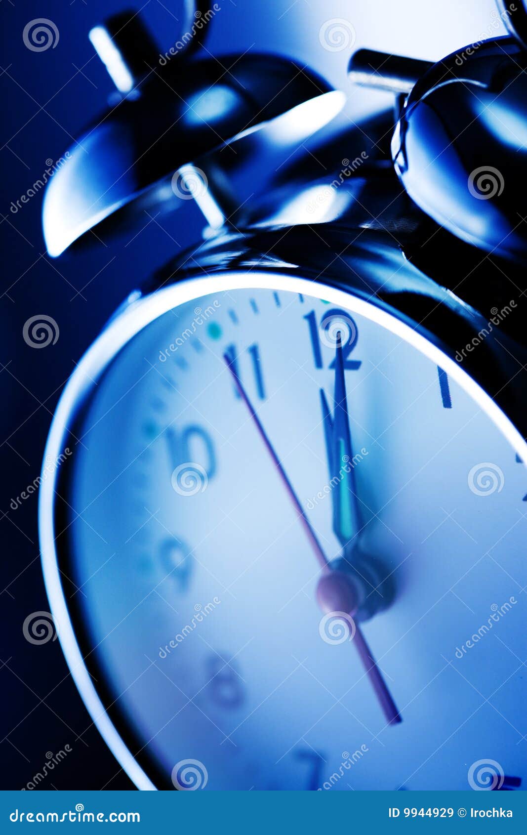 Blue alarm clock stock image. Image of light, blue, alarm 9944929