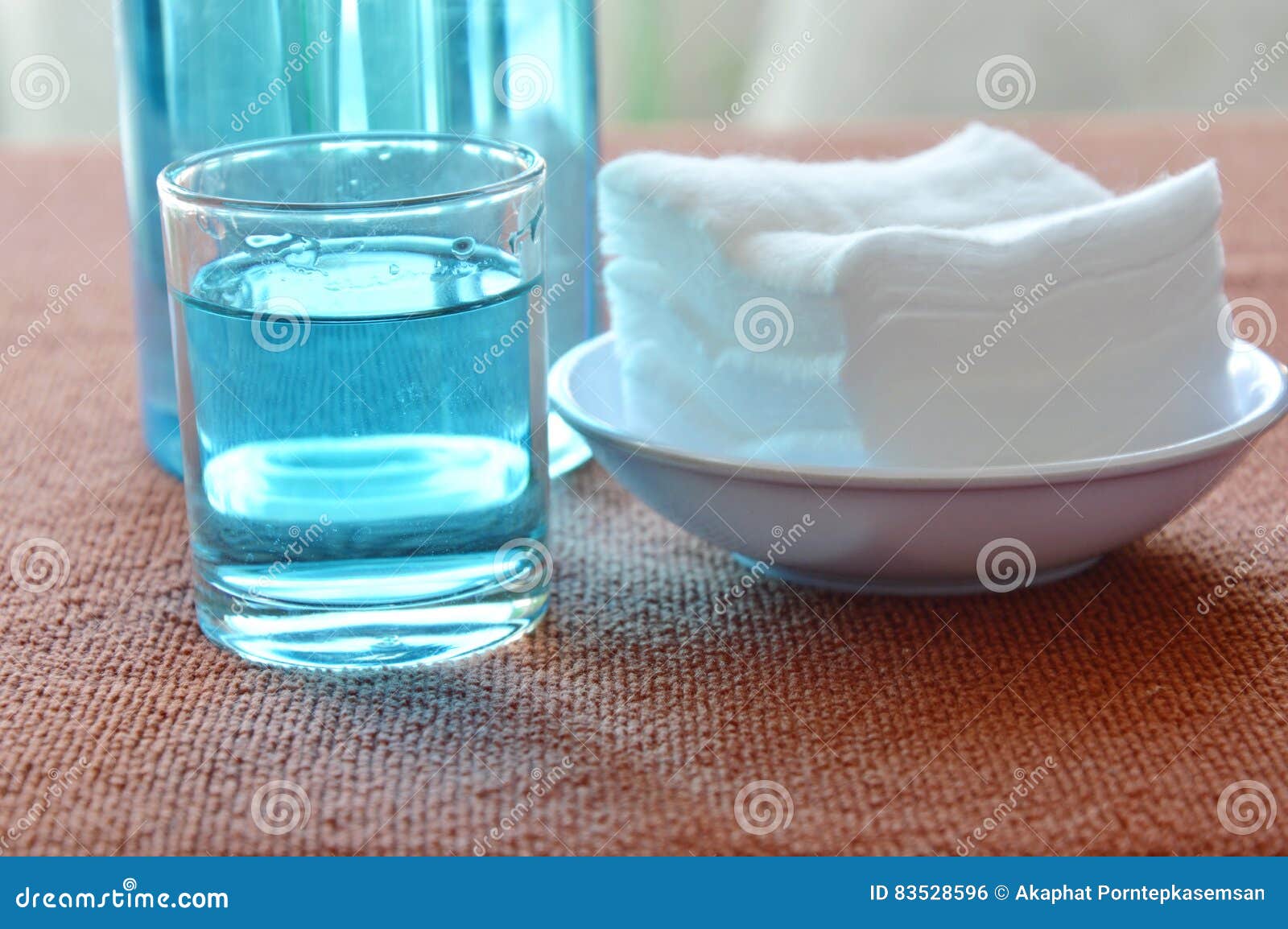 Blue Alcohol for Wash Wound in Glass and Clean White Cotton Stock Photo