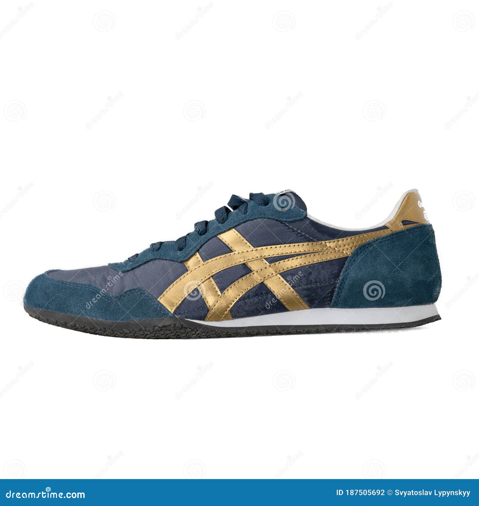 Blue Asics Brand Sneakers with Laces and Gold Accents on on White  Background. Onitsuka Tiger Brand Editorial Photography - Image of classic,  lifestyle: 187505692
