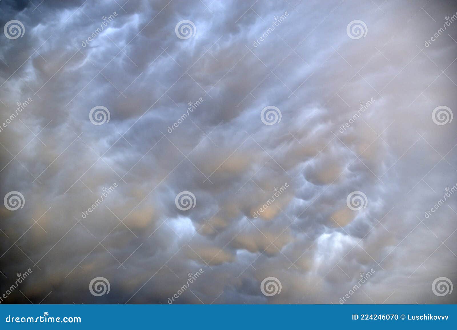 blue background of blue storm clouds summer thunderstorms mammatus vymeobraznye clouds
