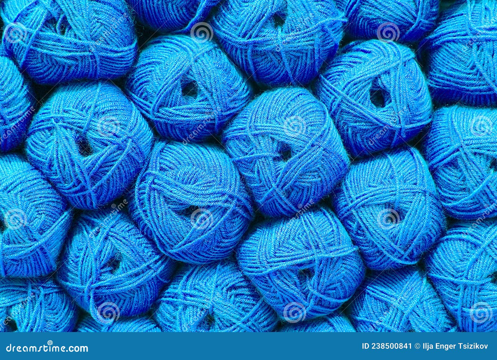 On Long Knitting Needles, a Row of Neat, Even Loops of Yarn of a