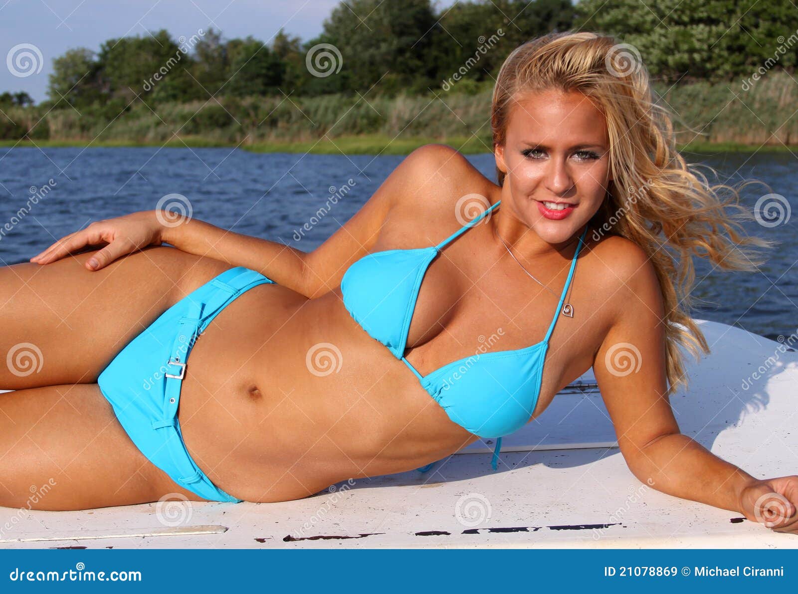 Girl in blue bikini stock photo. Image of tanned, beautiful - 11097392