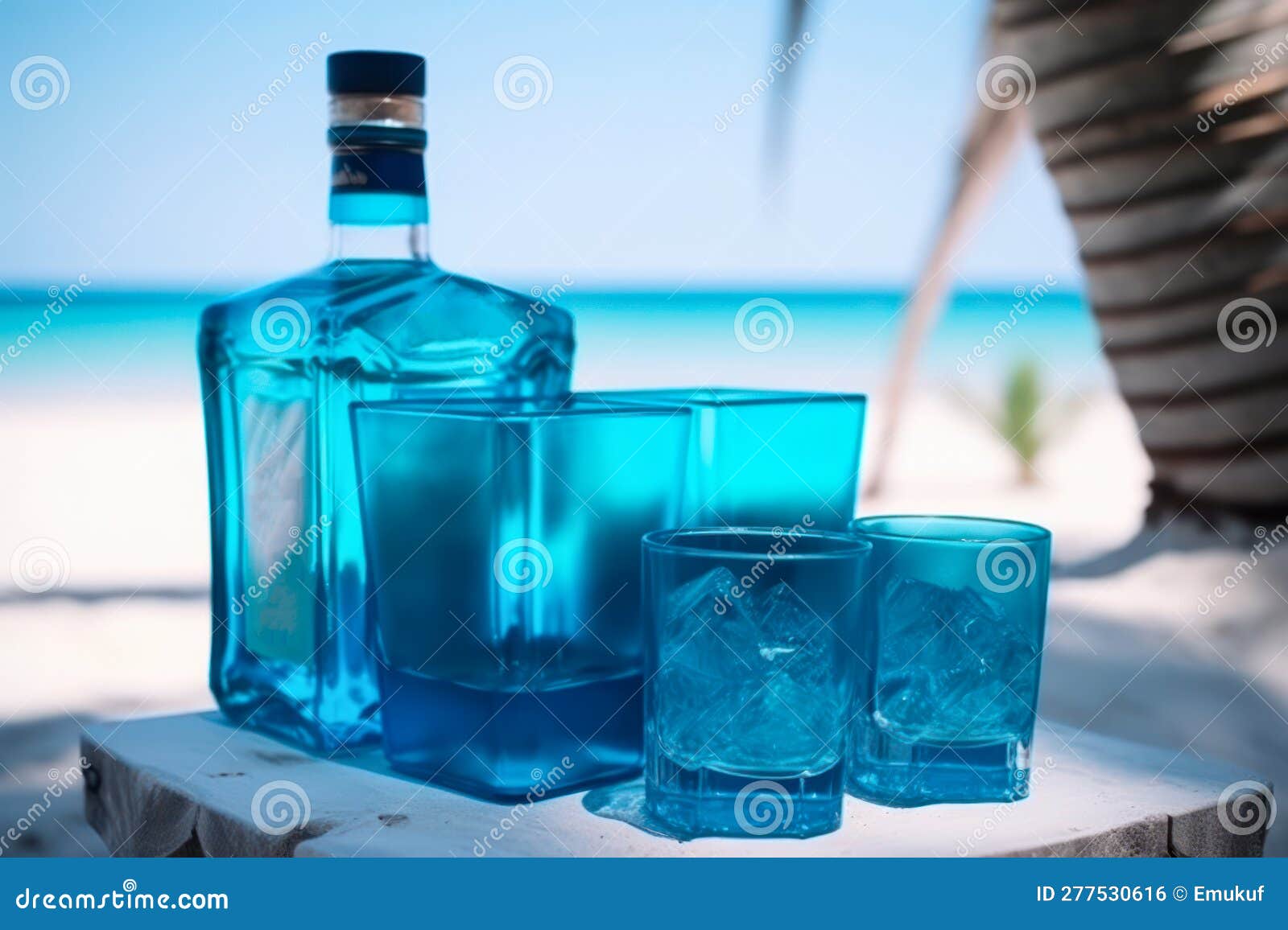 Blue Bottle with Alcoholic Drinks with Ice Cube Vacation by the Sea