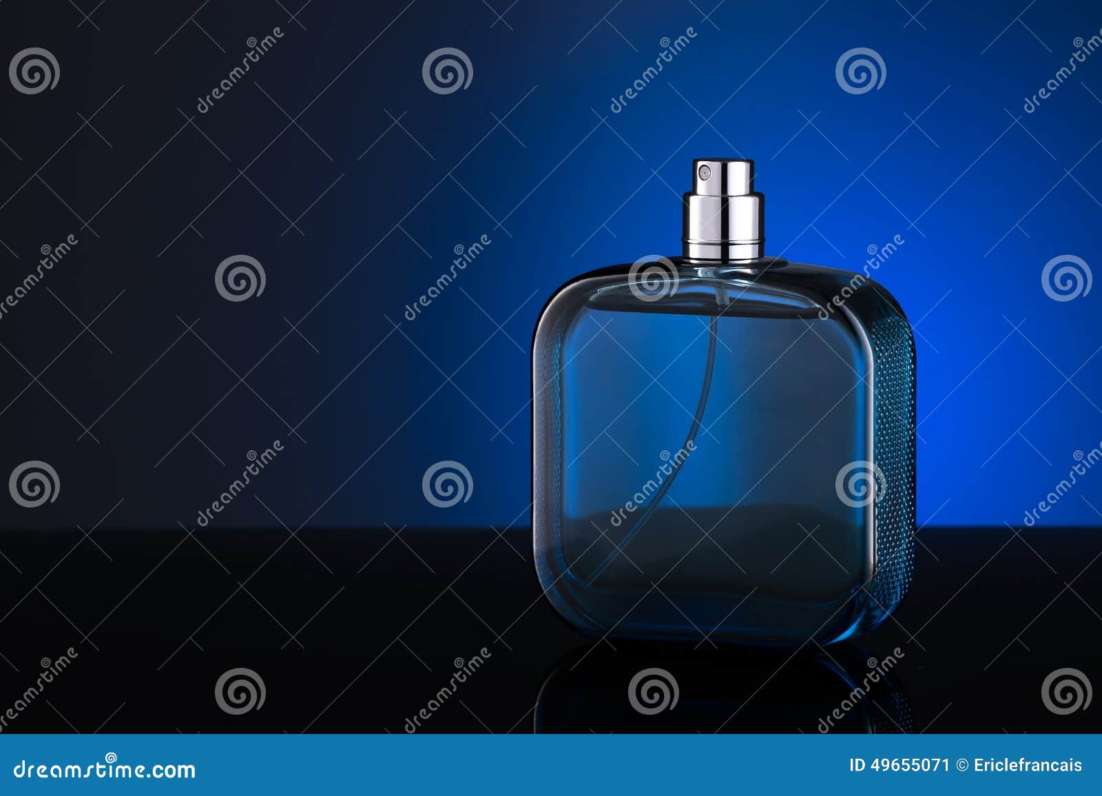 Blue bottle of perfume stock image. Image of fragrance - 49655071
