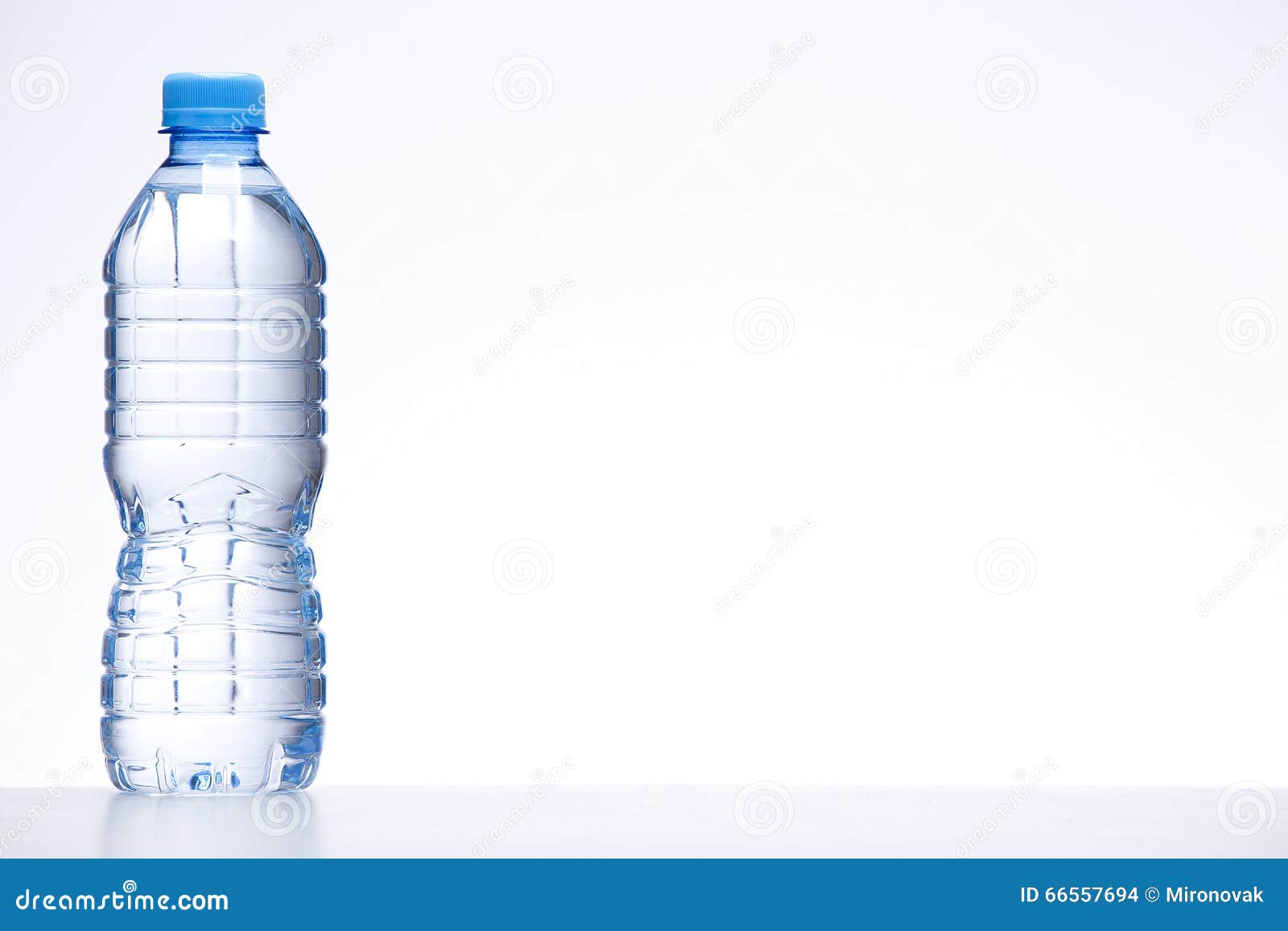 Blue bottle of water stock photo. Image of bottle, fresh 66557694