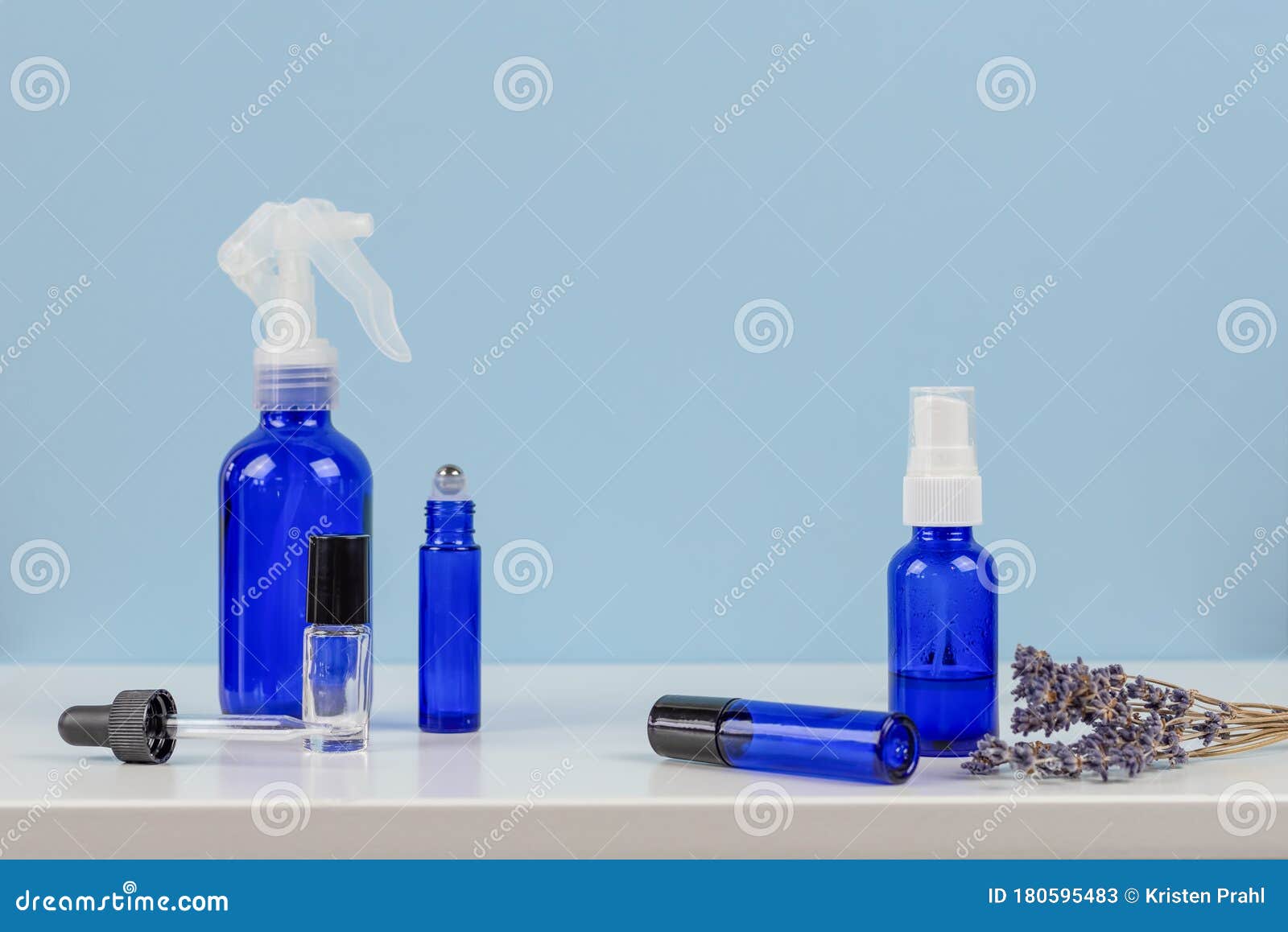 Blue Bottles and Rollers for Essential Oils Stock Image Image of medical, copy 180595483