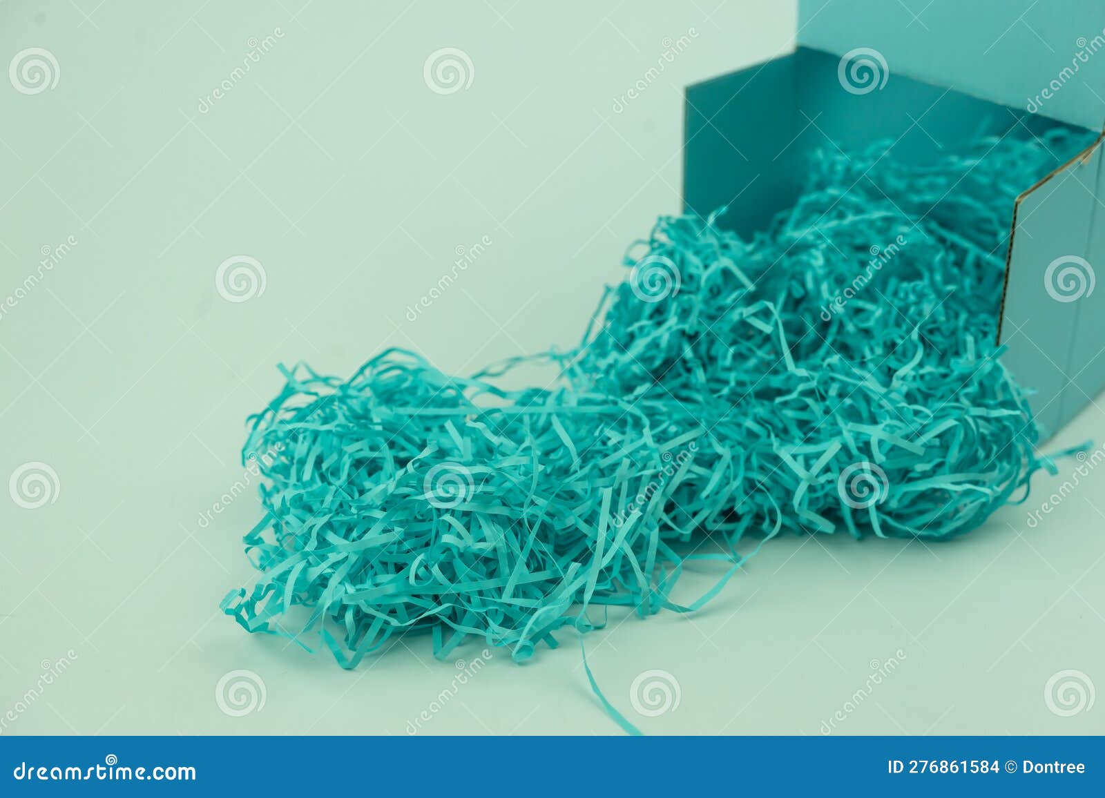 Blue Box with Blue Shredded Paper Packing Material Stock Photo Image