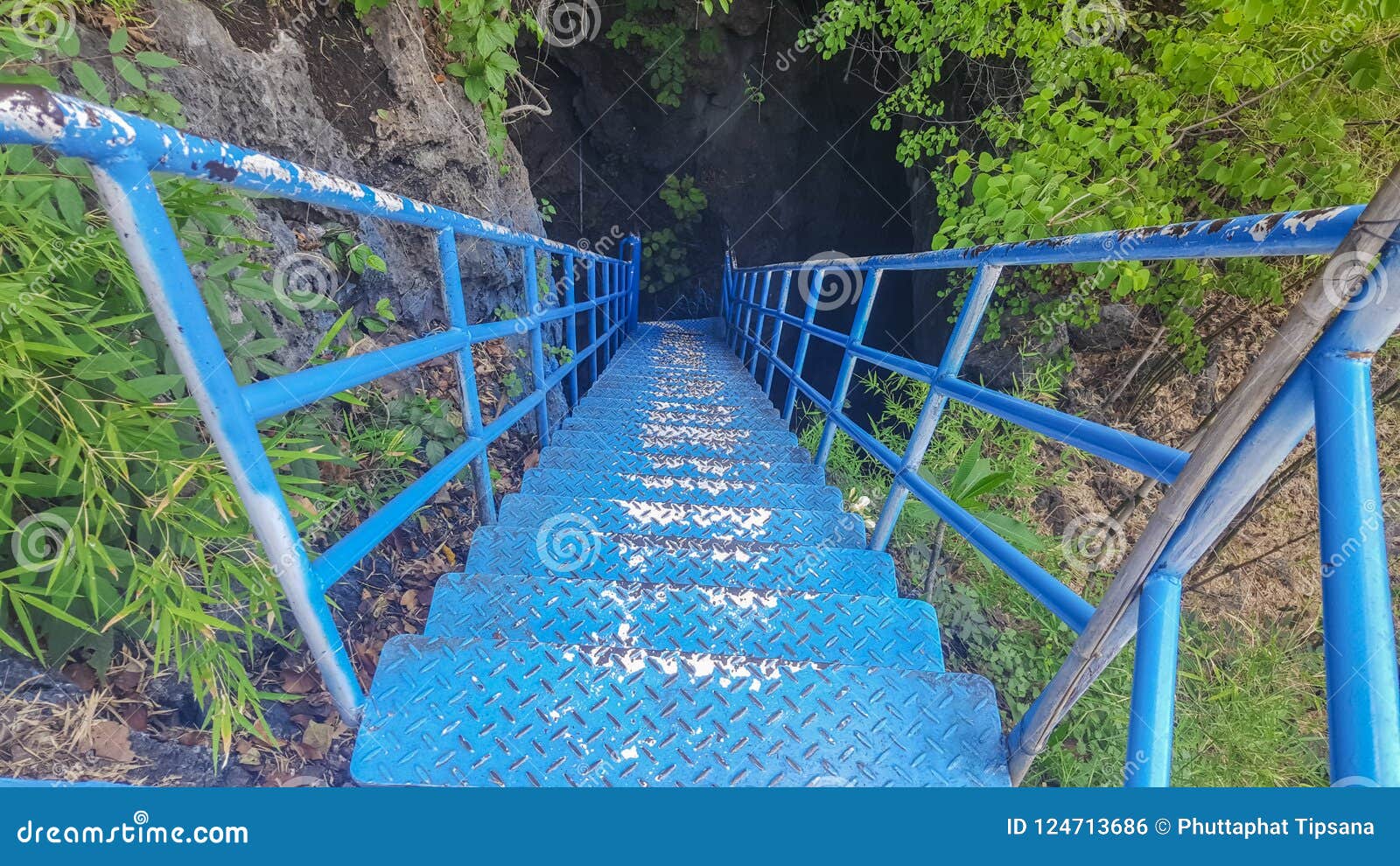 blue bridge for adventures in a dark cave. for tourists like excitement