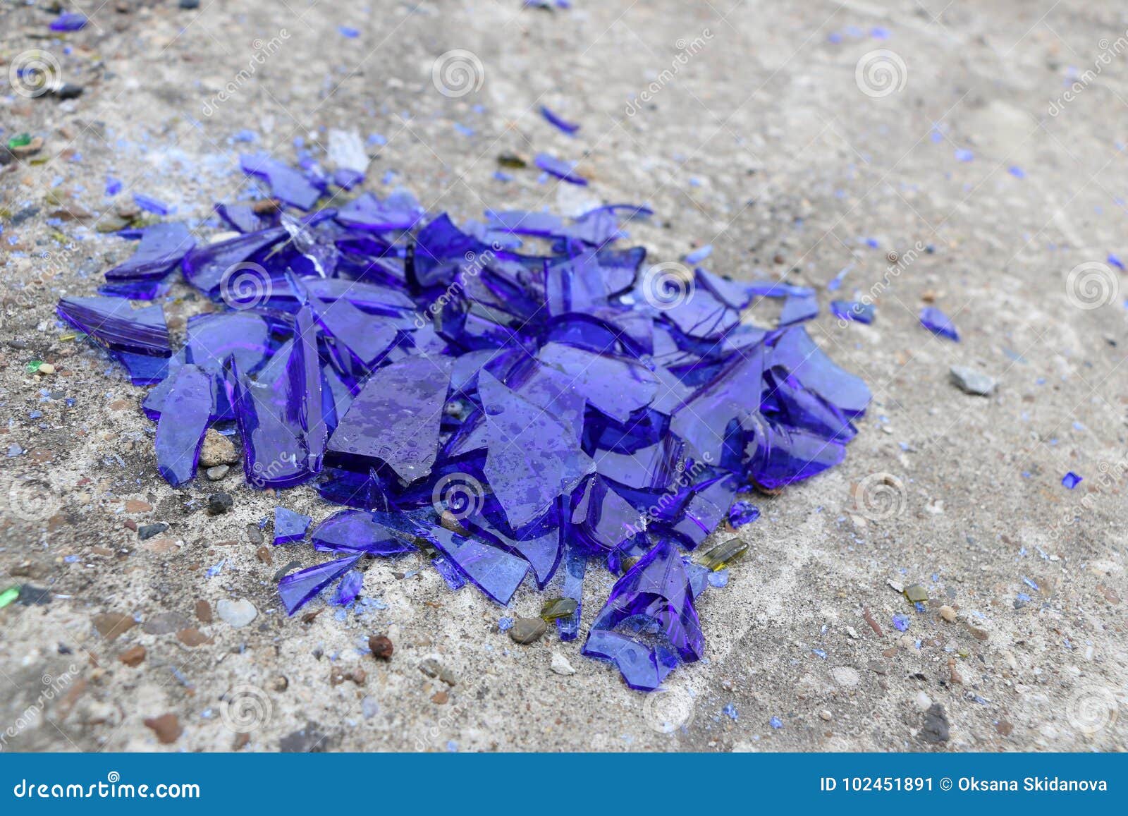 Blue Broken Glass On A Concrete Surface Texture For A Background