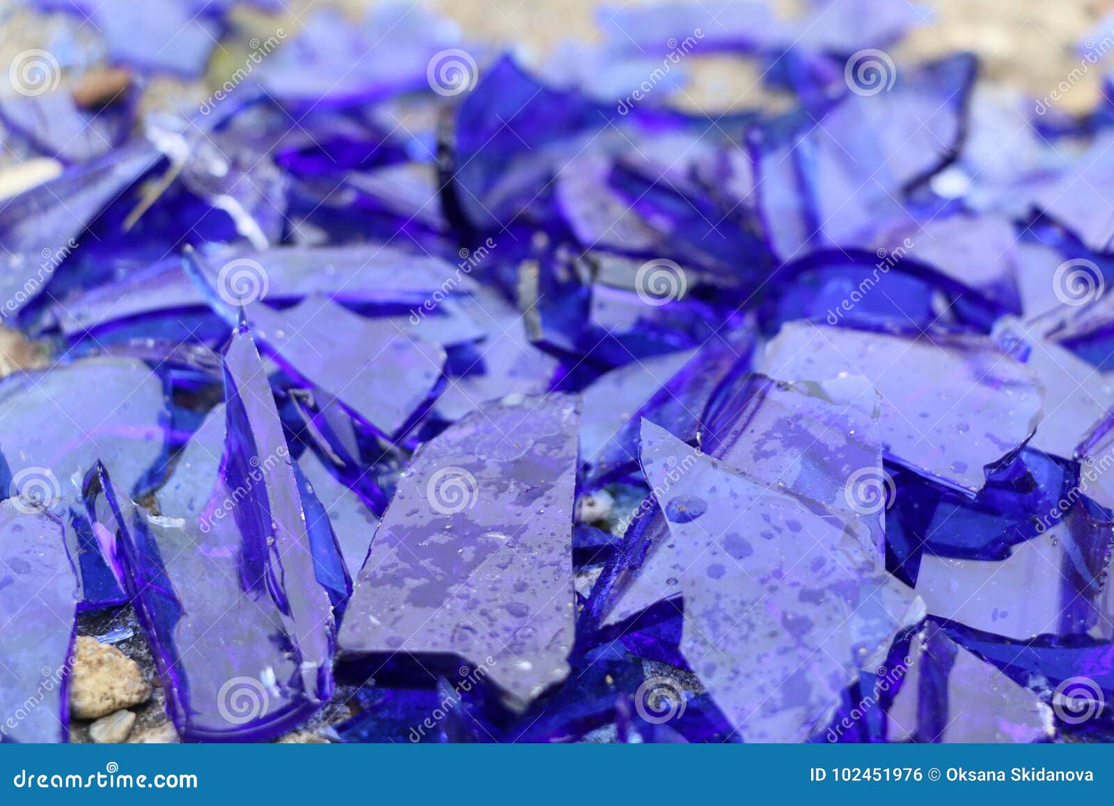 Blue Broken Glass On A Concrete Surface Texture For A Background