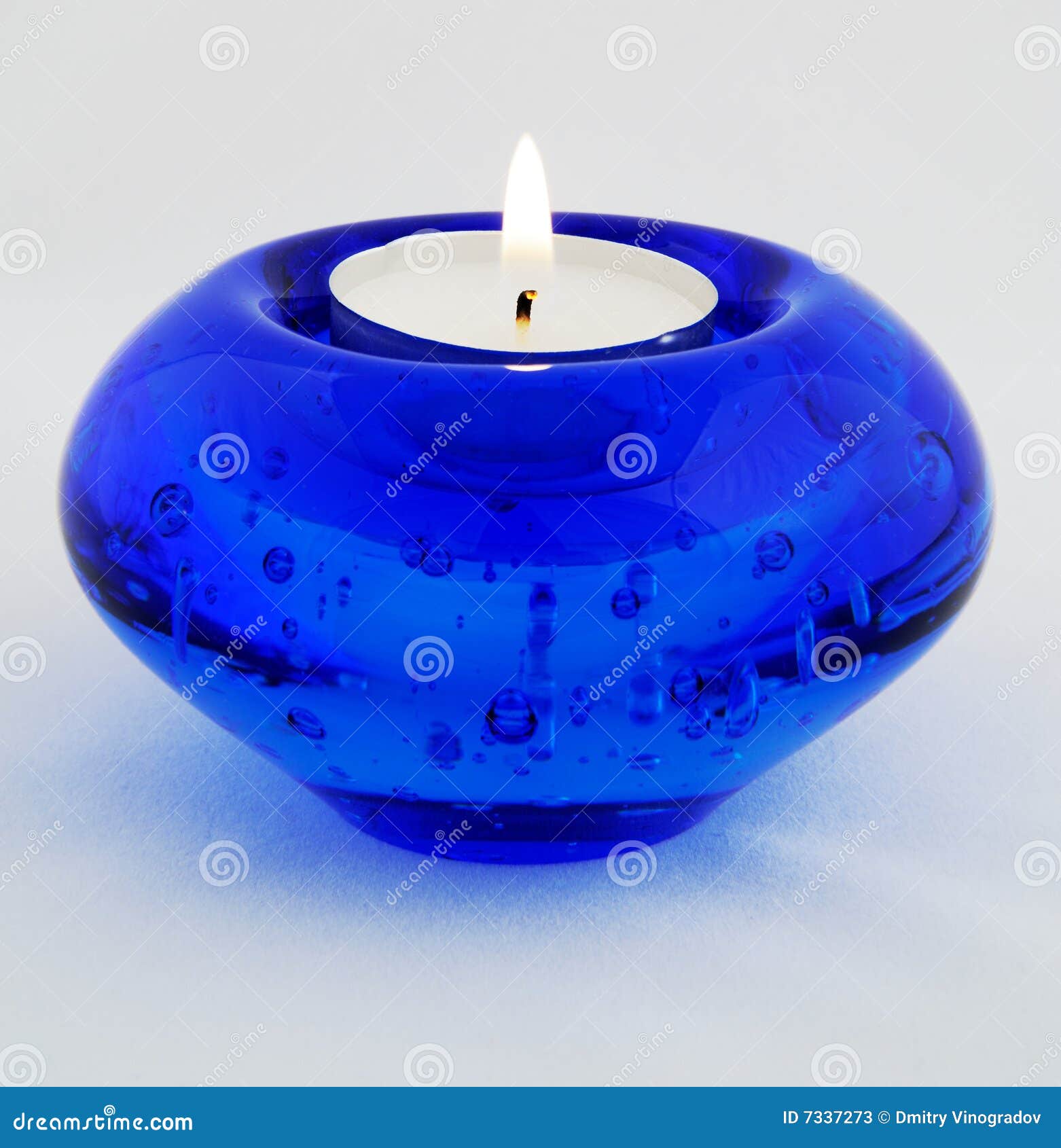 Blue candle stock image. Image of glass, shape, white 7337273